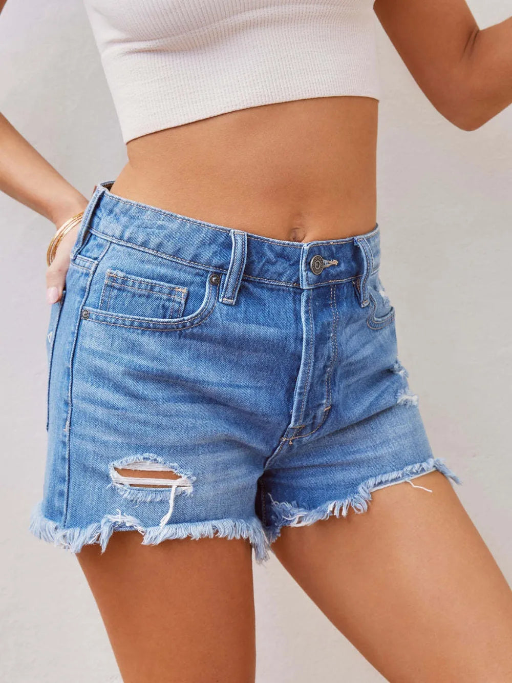 Distressed Raw Hem Denim Shorts in Light Blue by X@Y@K