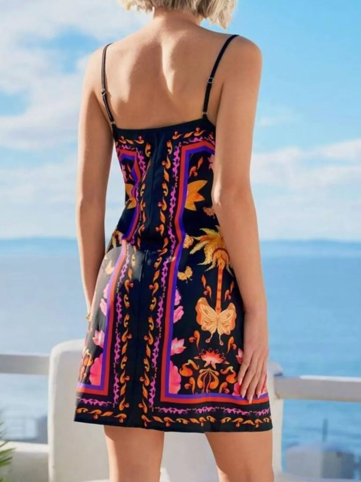 Floral Spaghetti Strap Wrap Mini Dress by Rosaline