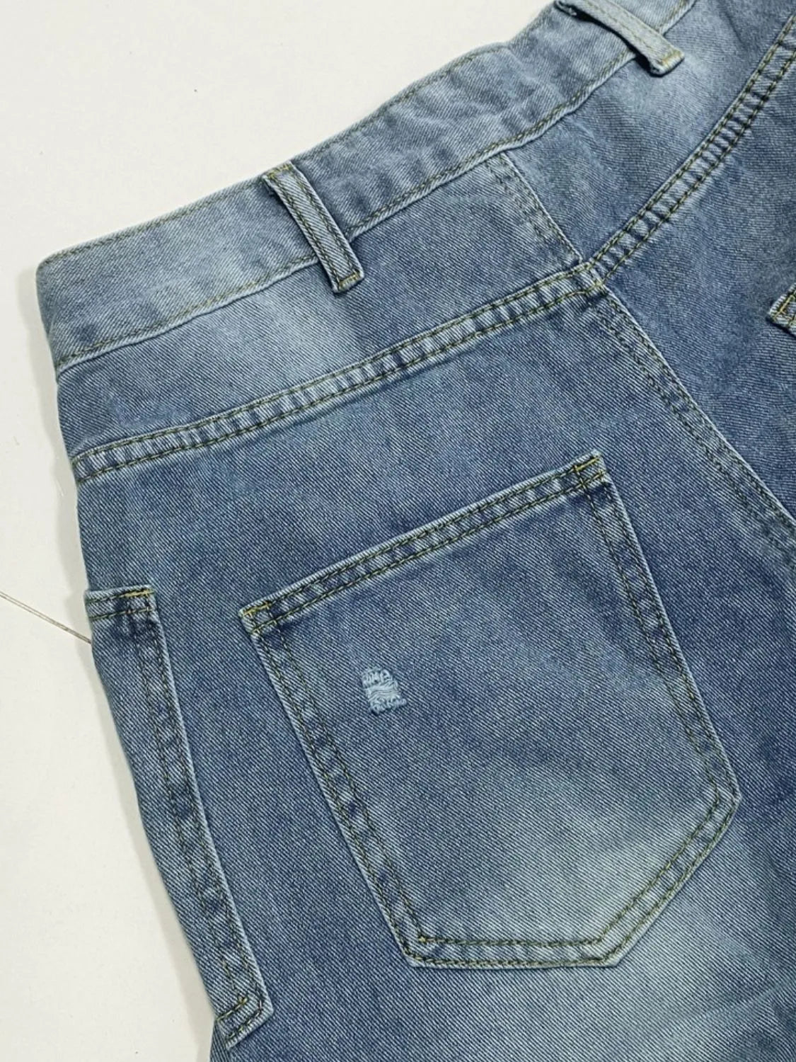 Distressed Jeans in Light Wash