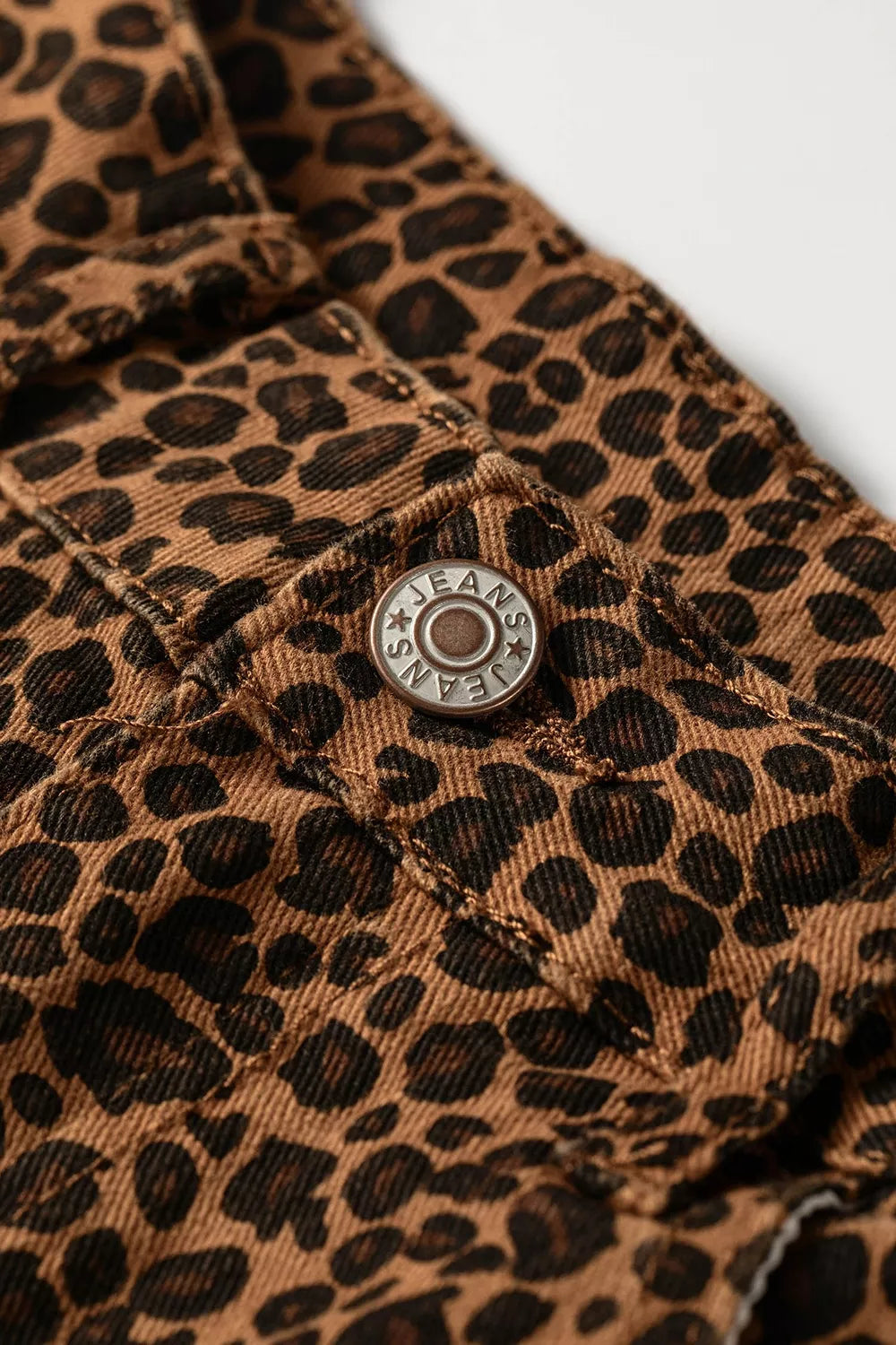 Leopard Print Ruffled Hem Jeans in Dark Brown