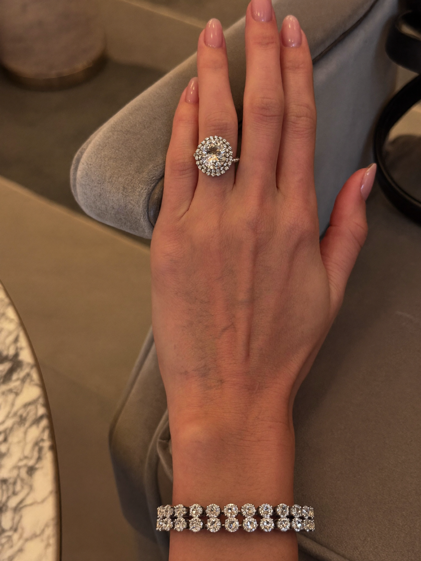 ilussa moissanite halo ring and tennis bracelet — editorial hand shot