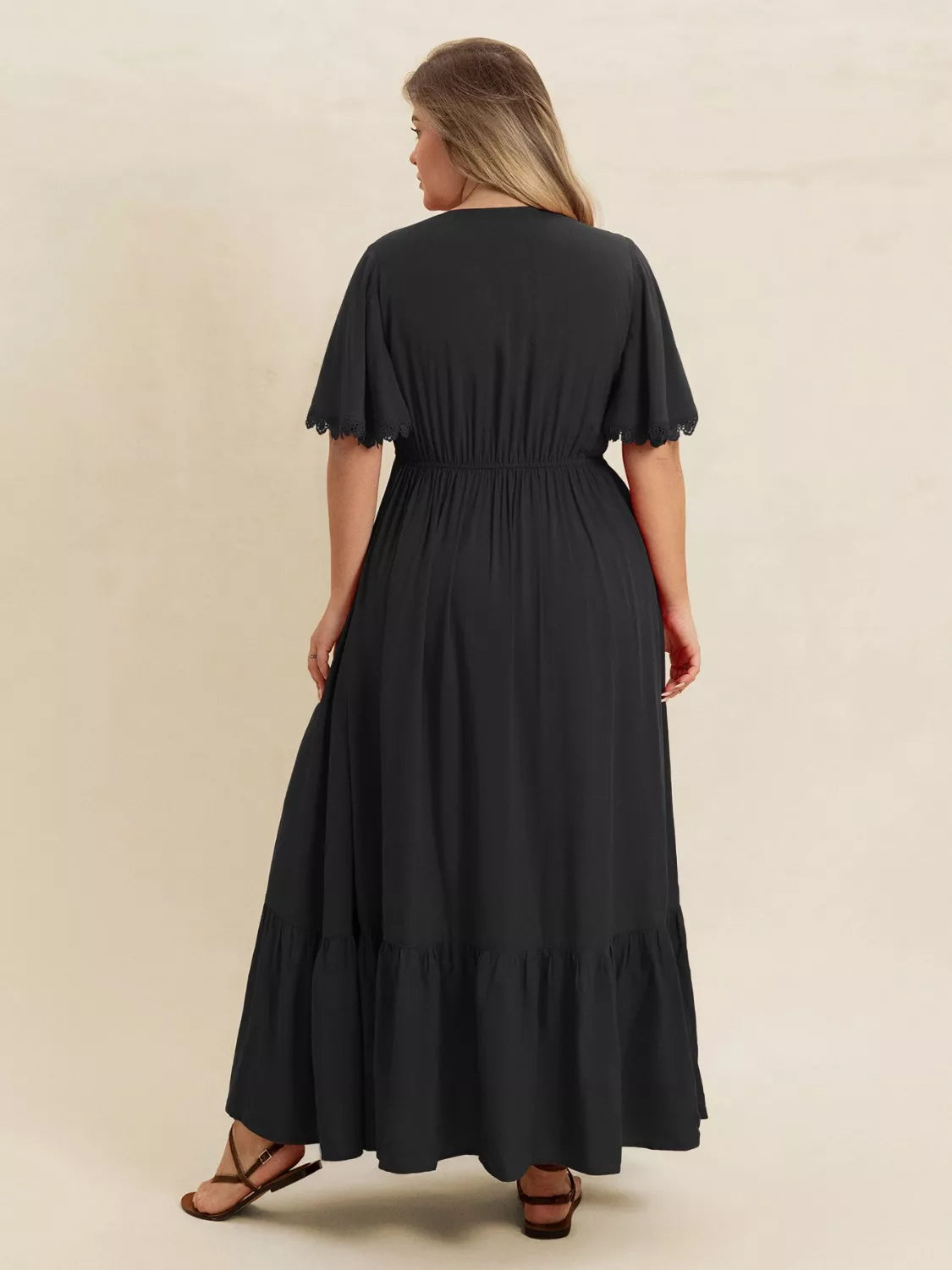 Ruffled Maxi Dress with Flutter Sleeves in Black