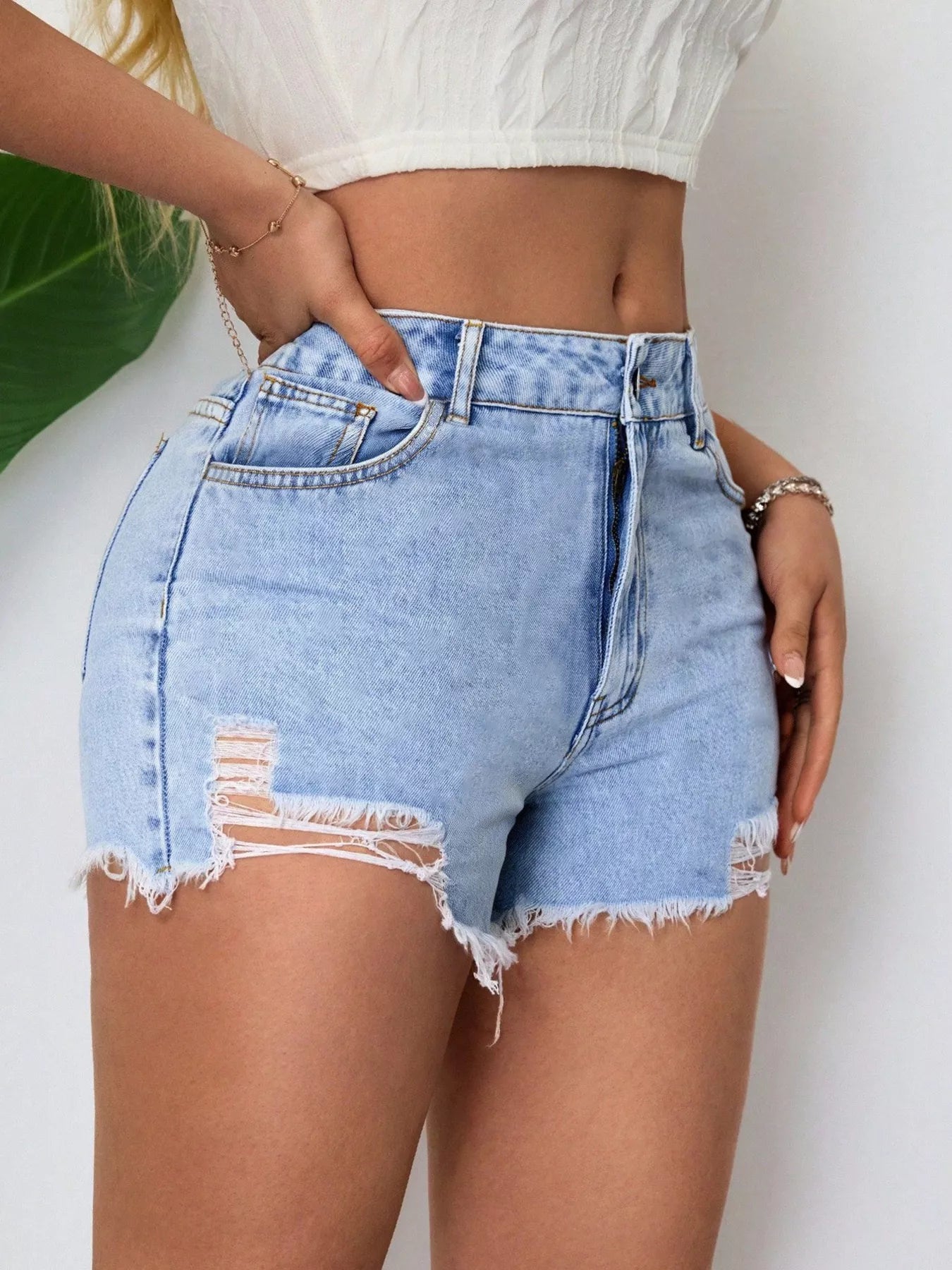 Distressed Raw Hem Denim Shorts in Blue
