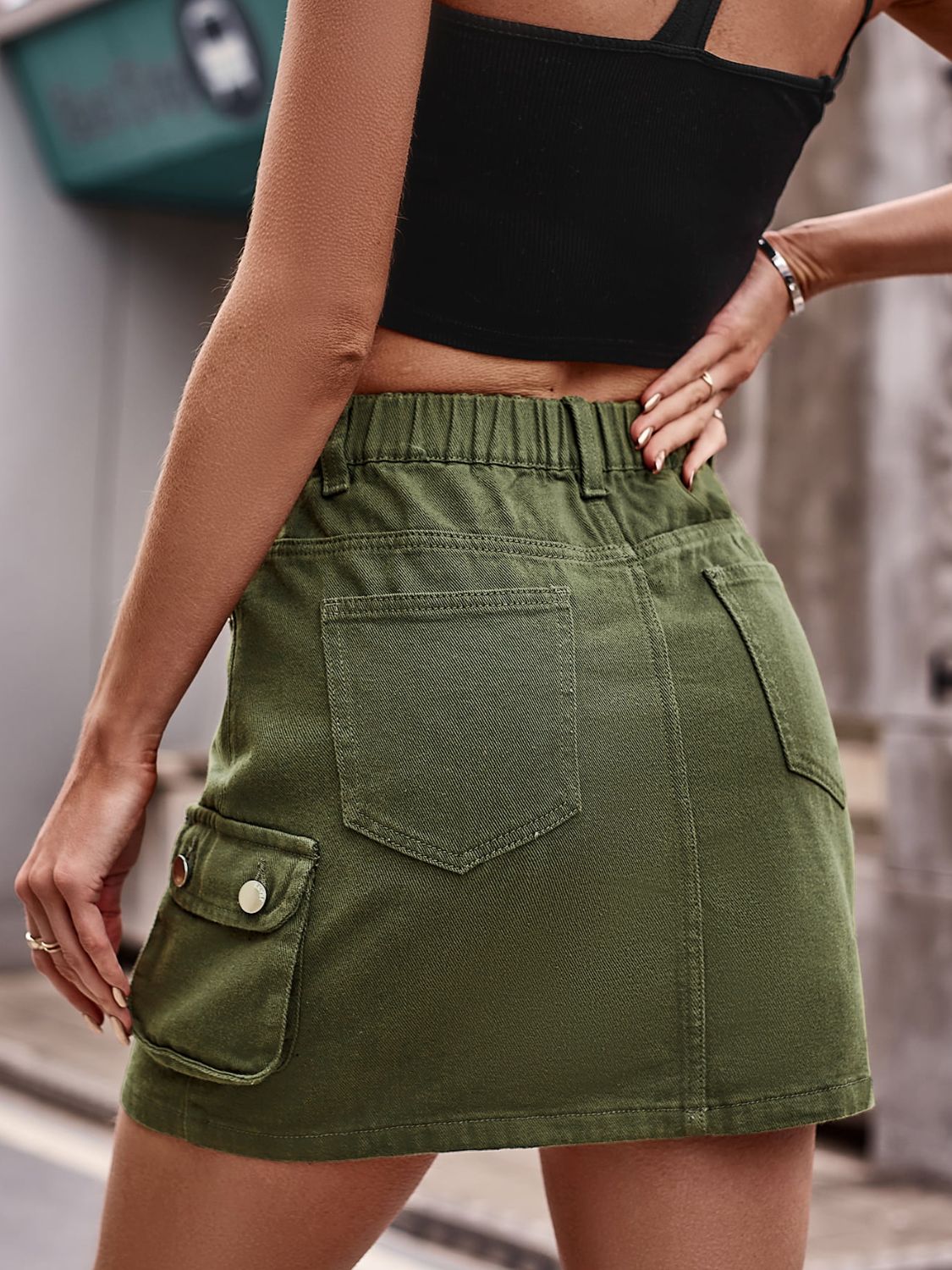 Denim Mini Skirt with Pockets by Manny
