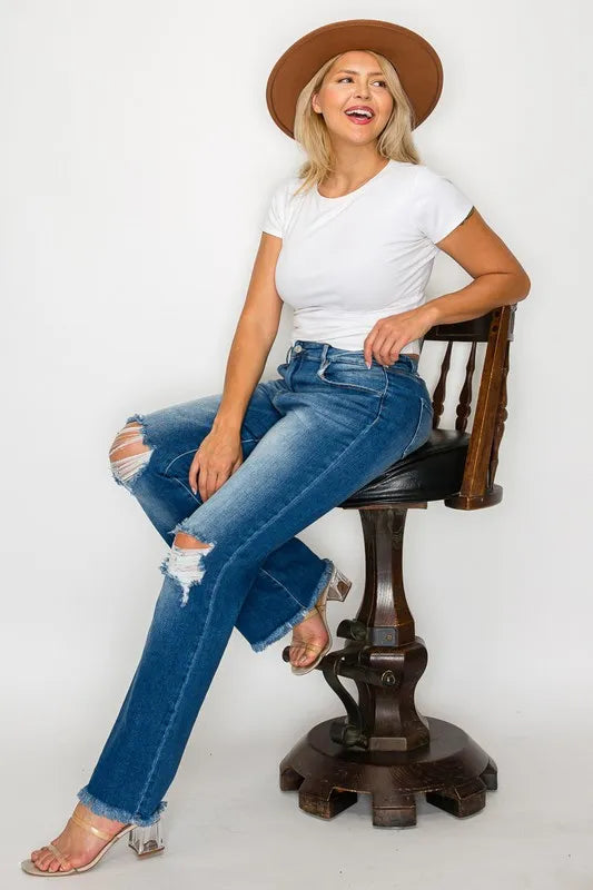 Raw Hem Distressed High Rise Bootcut Jeans in Medium Wash
