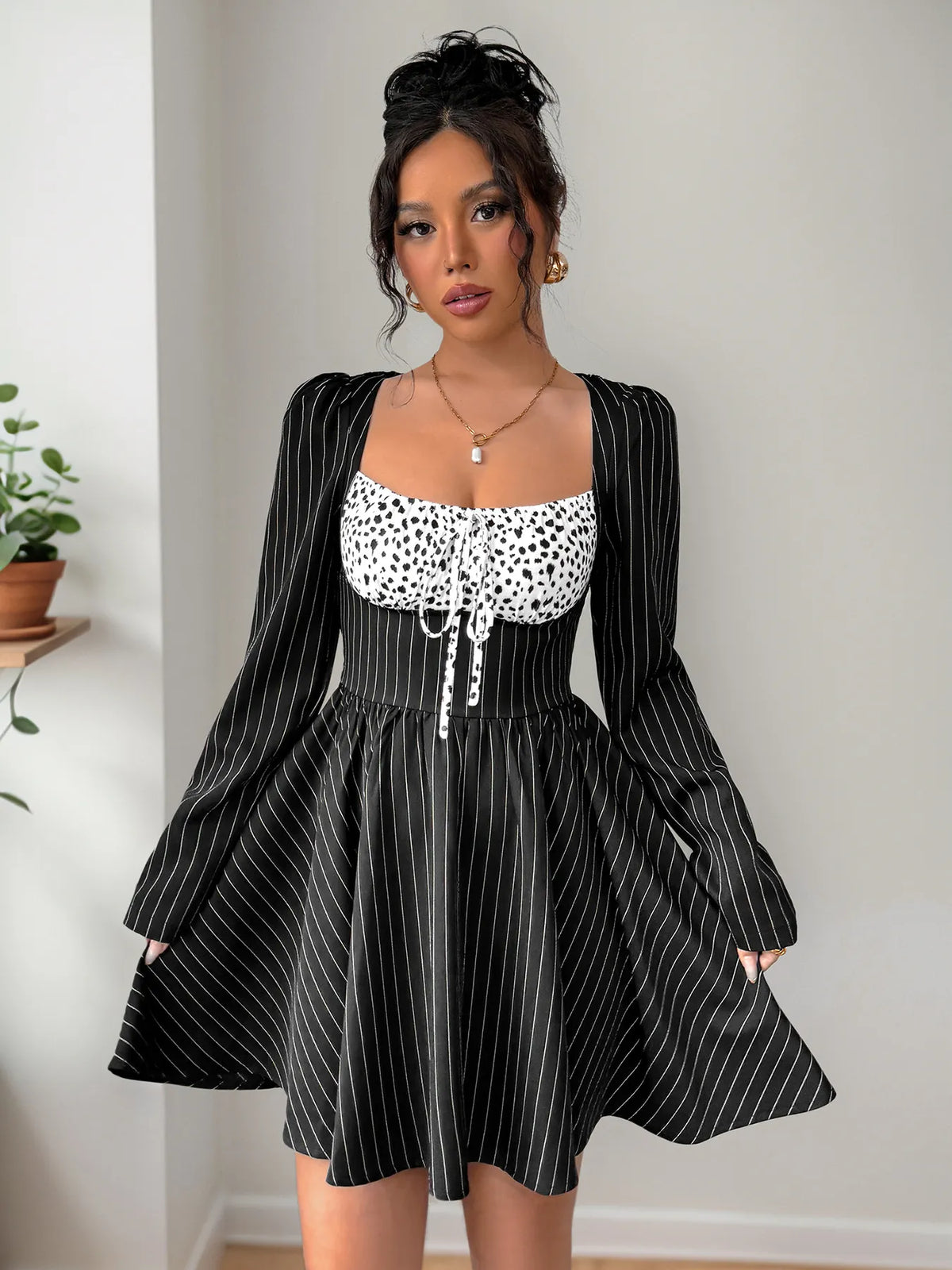 Ruffled Striped Mini Dress in Black