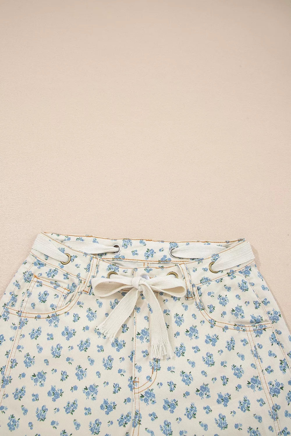 Grommet Knot Waist Floral Barrel Leg Jeans in Beige
