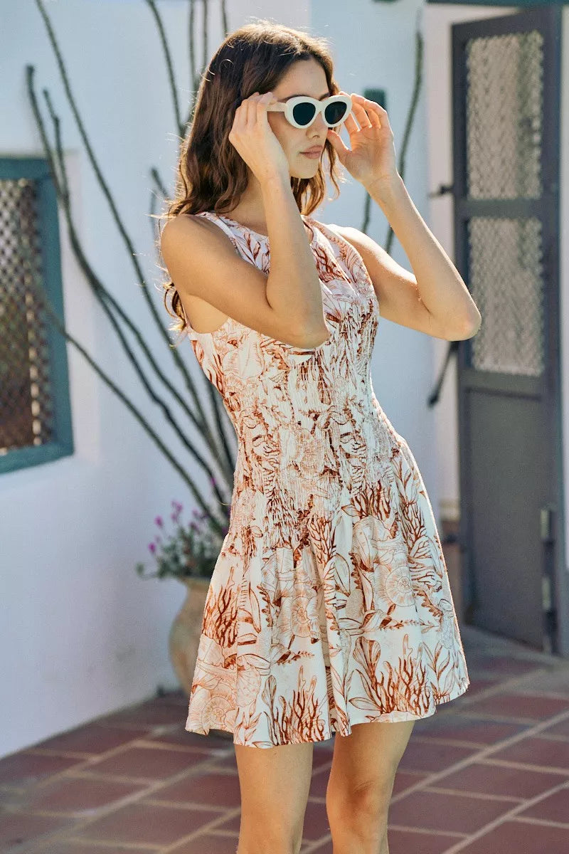 So Me Shell Print Smocked Mini Dress in Taupe
