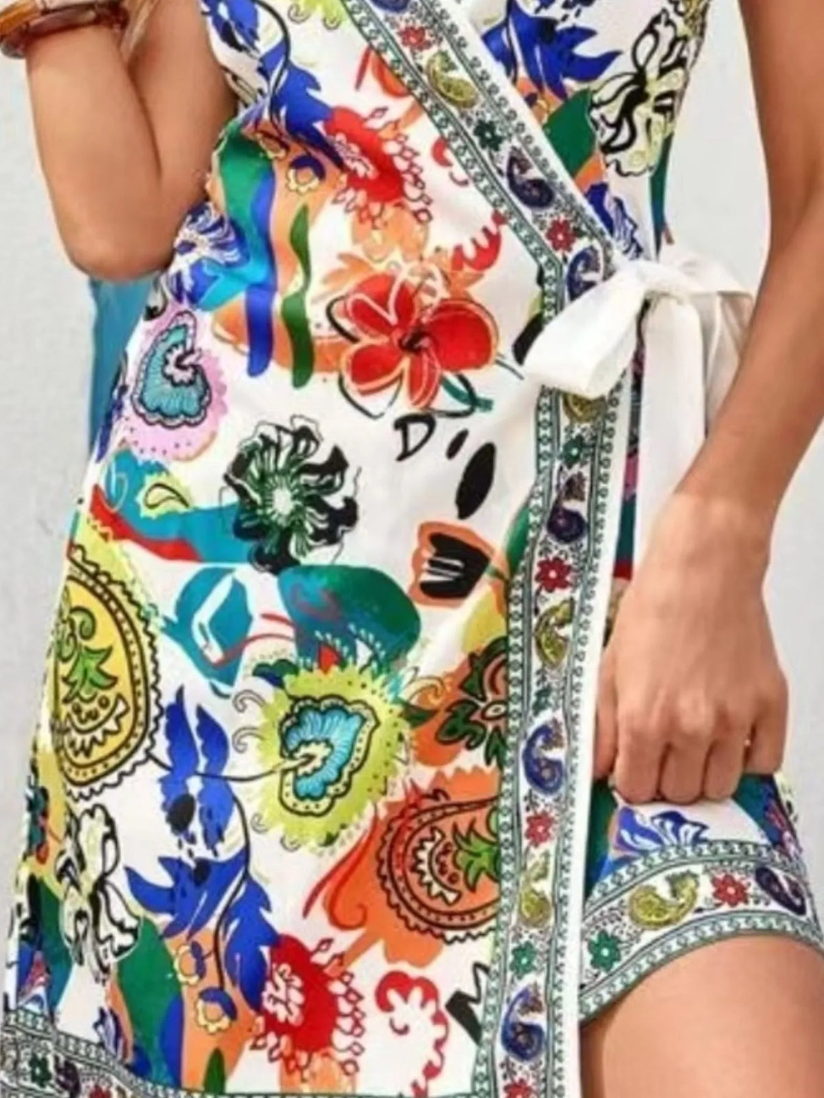 Floral Spaghetti Strap Wrap Mini Dress by Rosaline