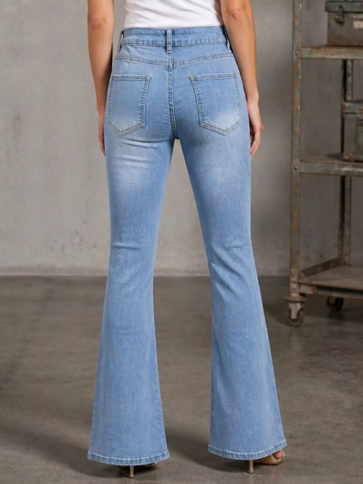 High-Waisted Distressed Flare Jeans in Light Blue by Dreamy Drapes