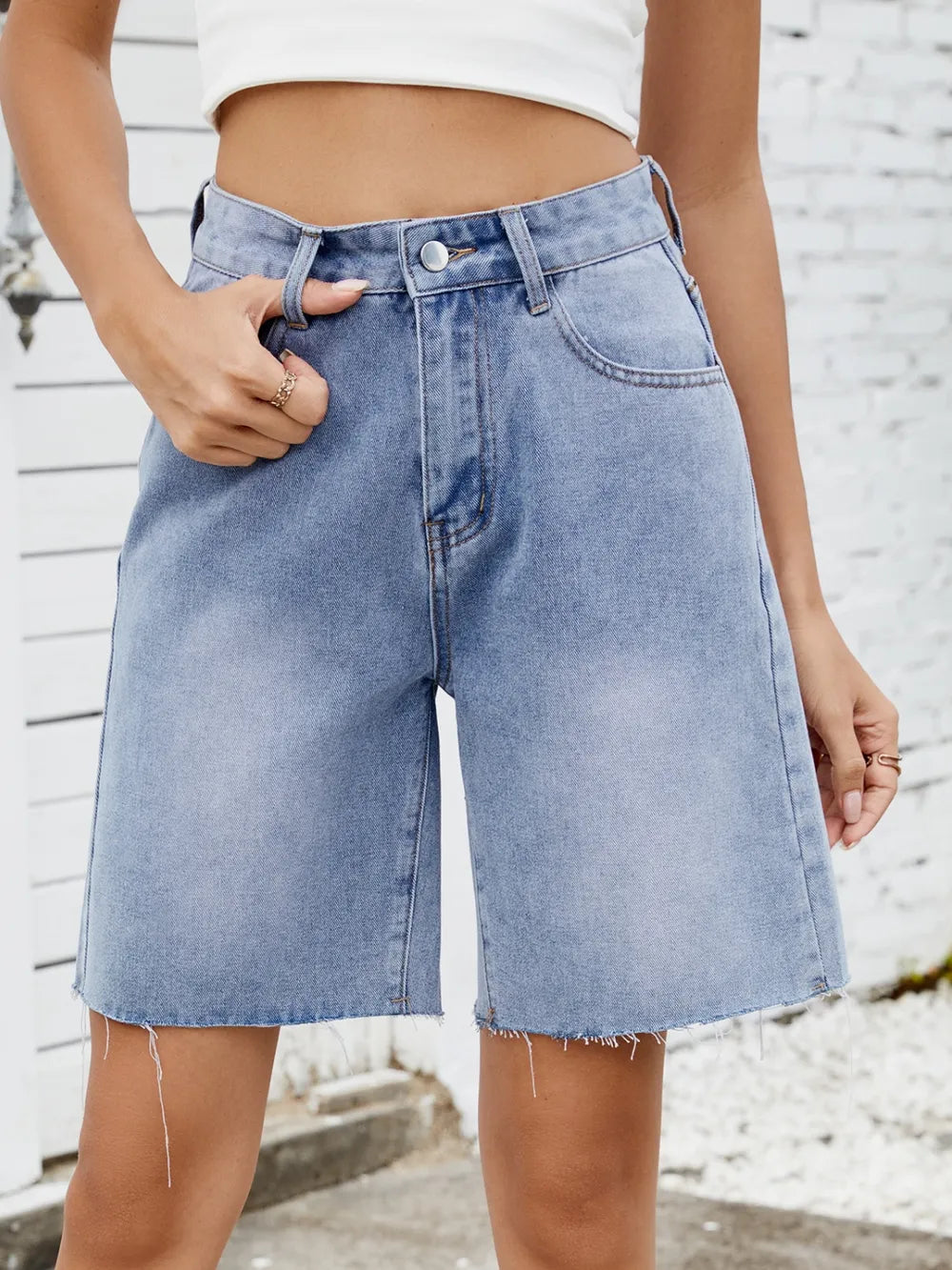 Washed Raw Hem Denim Shorts by Moni Wear