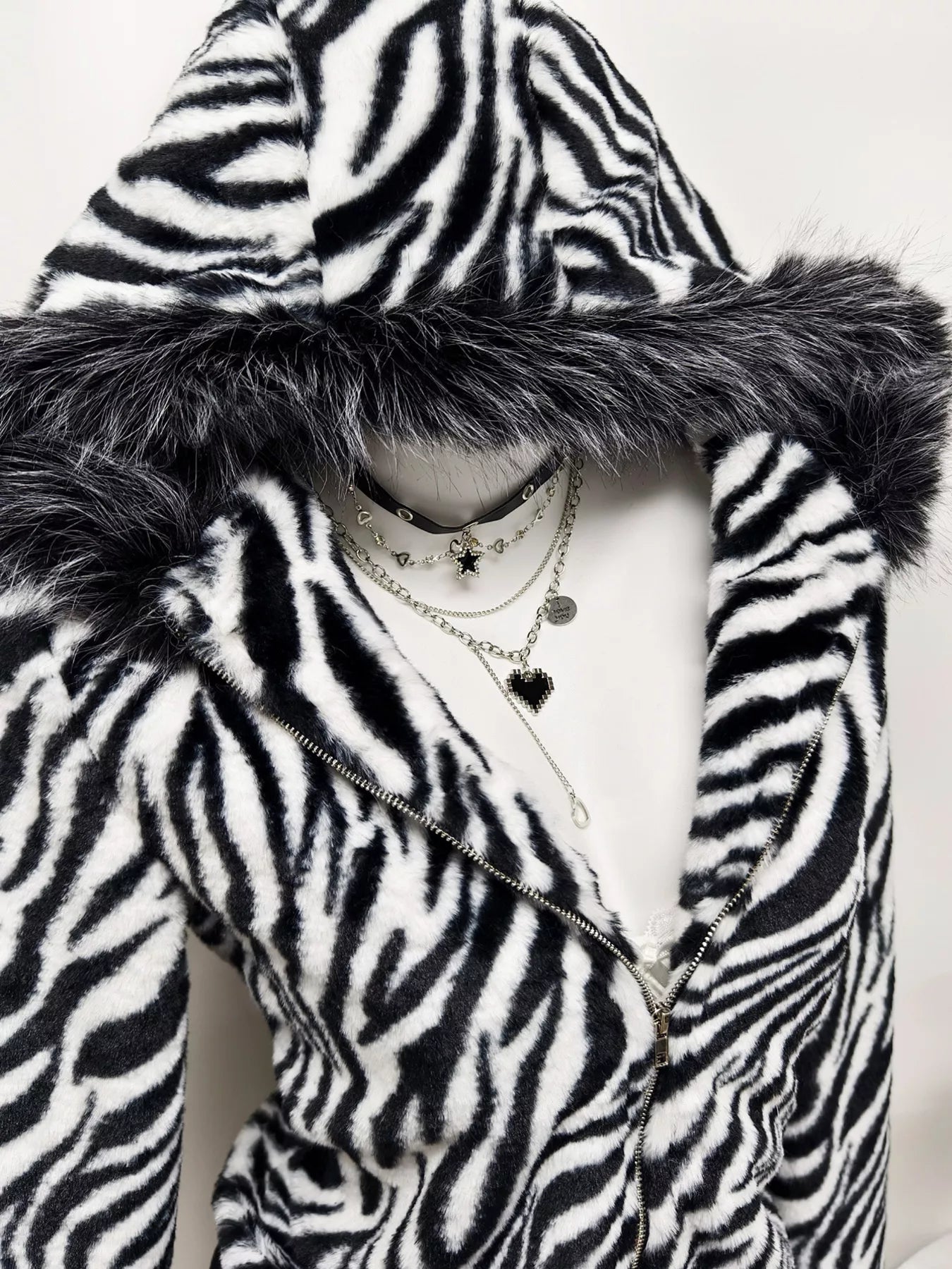 Zebra Faux Fur Hooded Zip-Up Jacket in Black