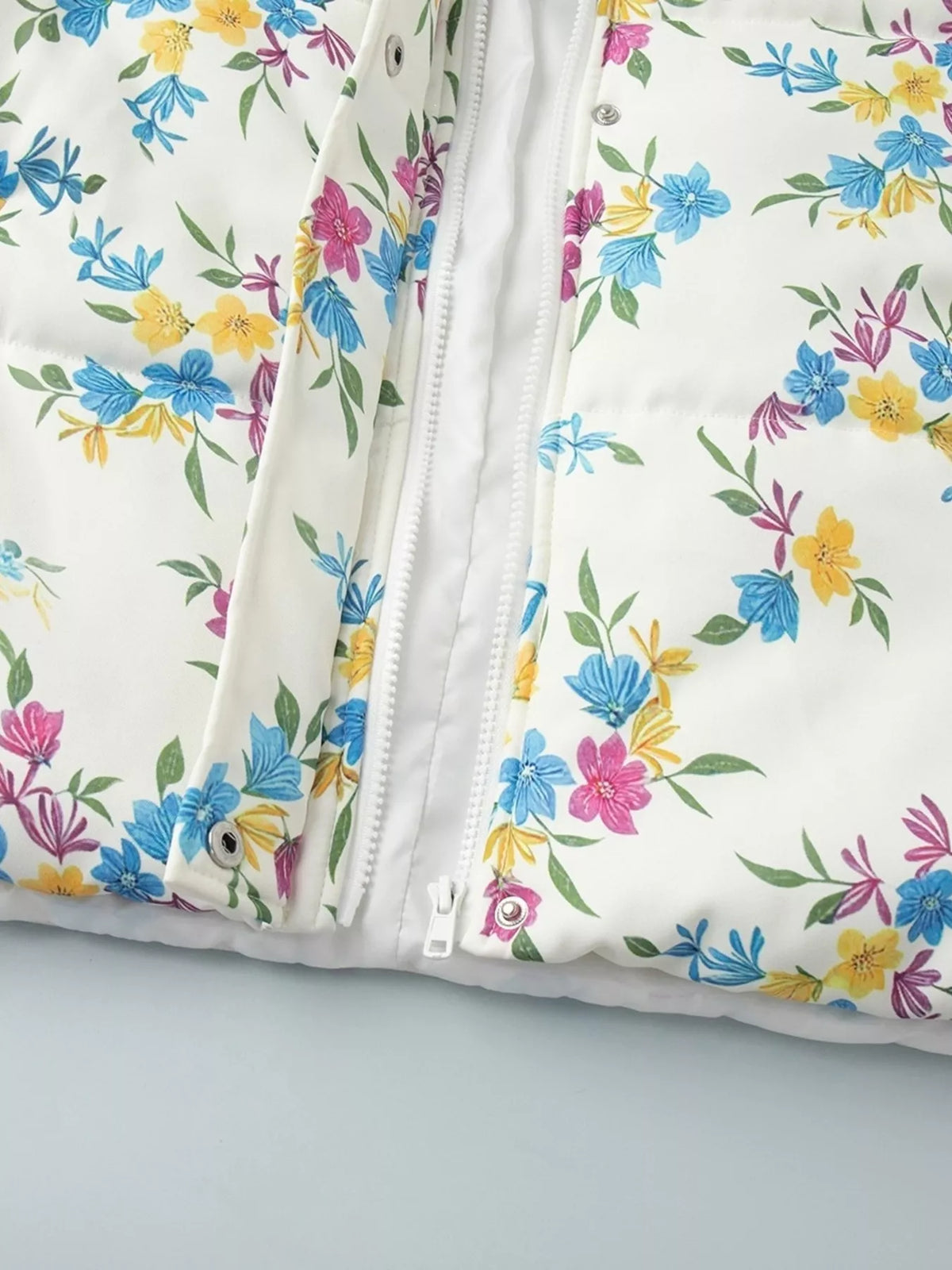 Floral Print Puffer Jacket in White by Prisca