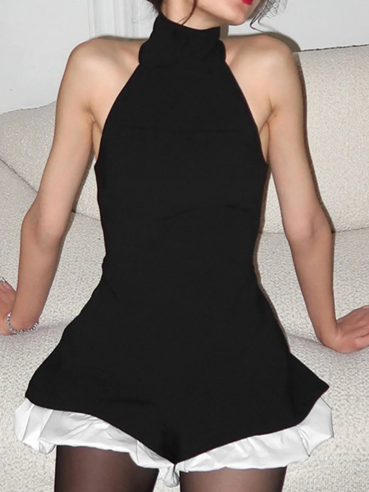 Halter Neck Ruffled Hem Romper in Black
