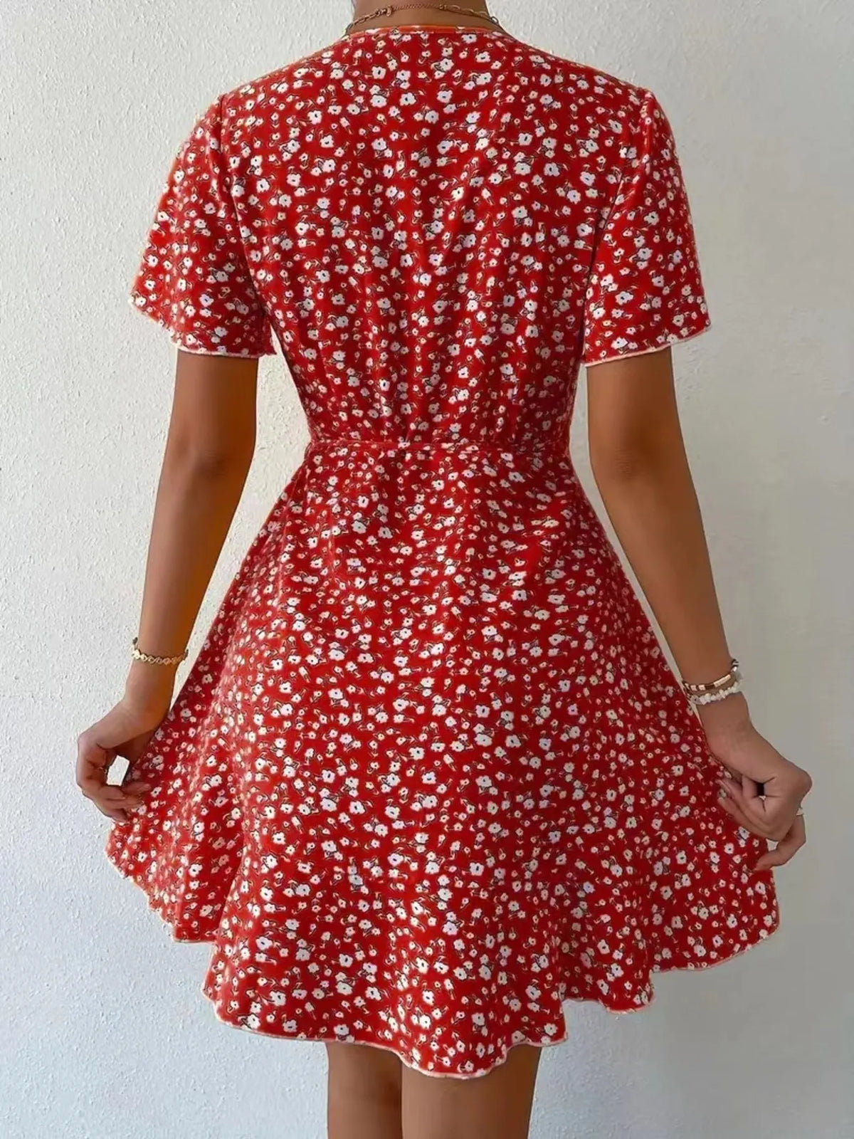 Floral Flutter Sleeve Wrap Mini Dress by Elaine