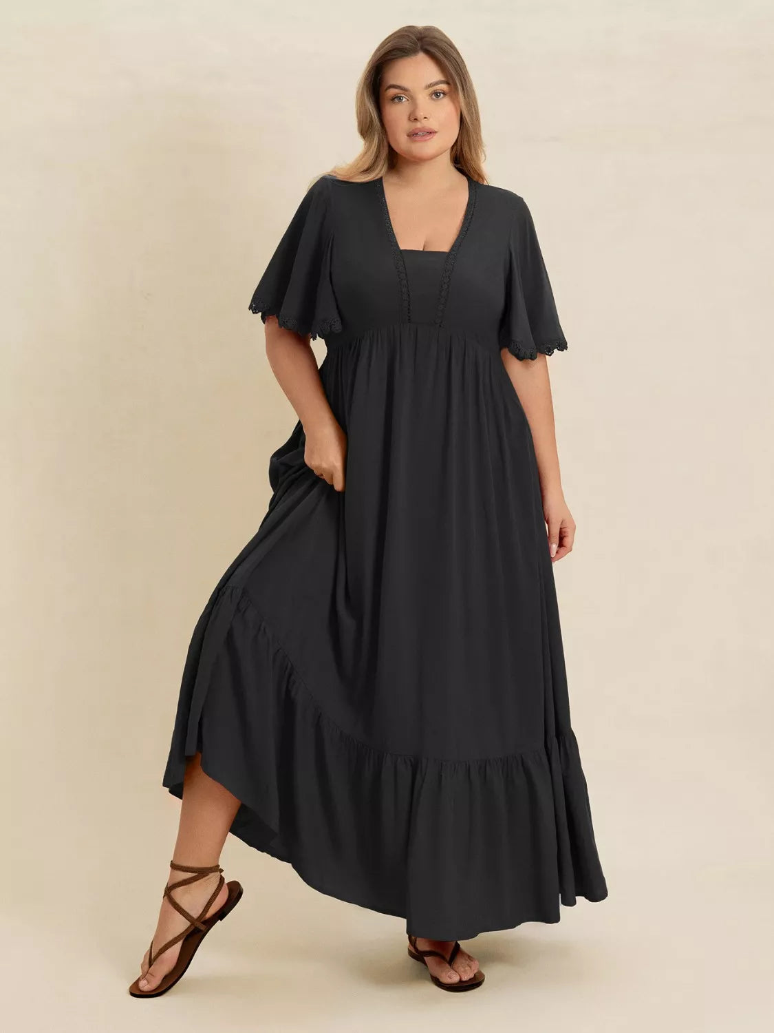 Ruffled Maxi Dress with Flutter Sleeves in Black