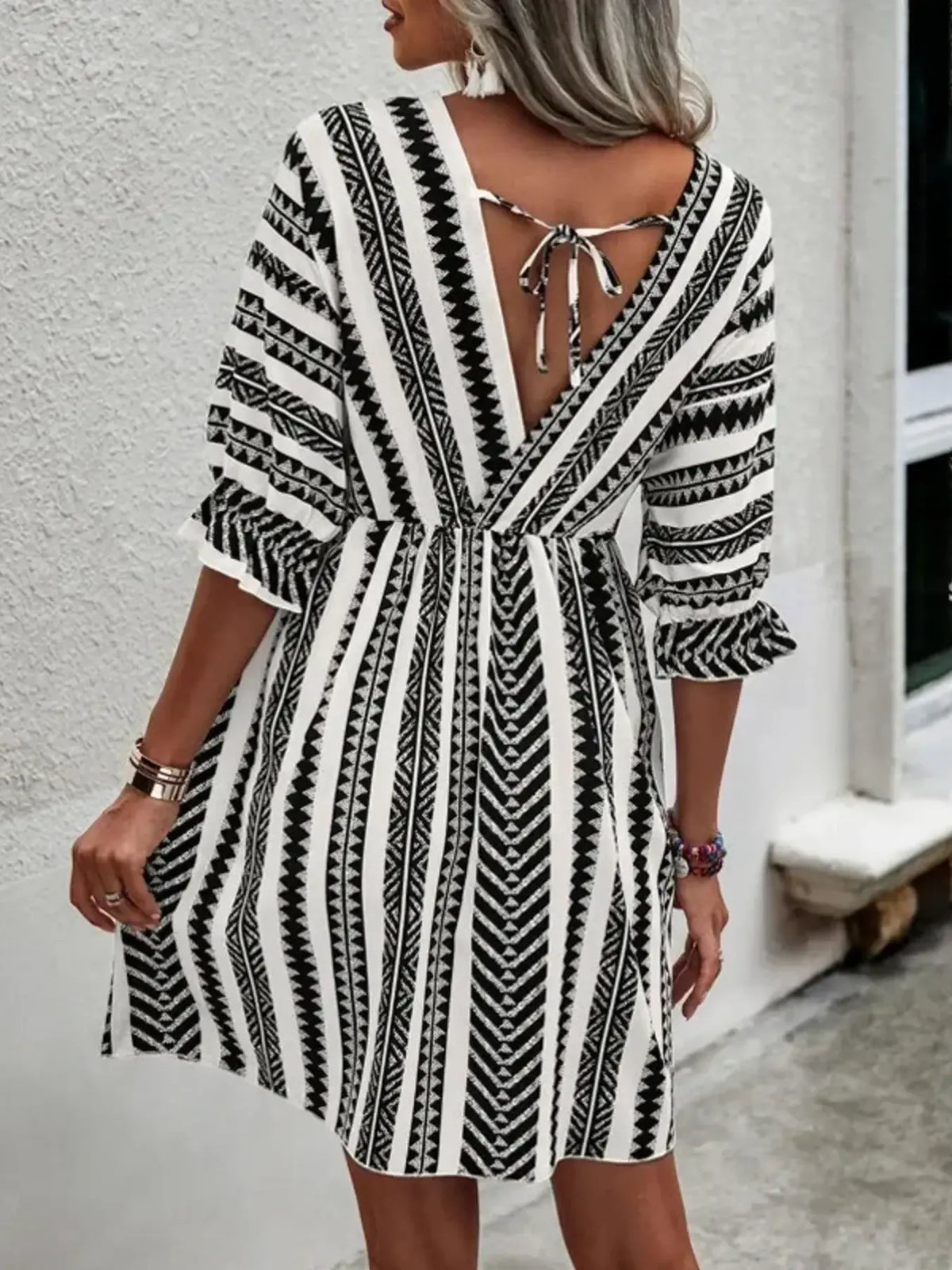 Geometric Print V-Neck Mini Dress in Black by ArtisticExpression
