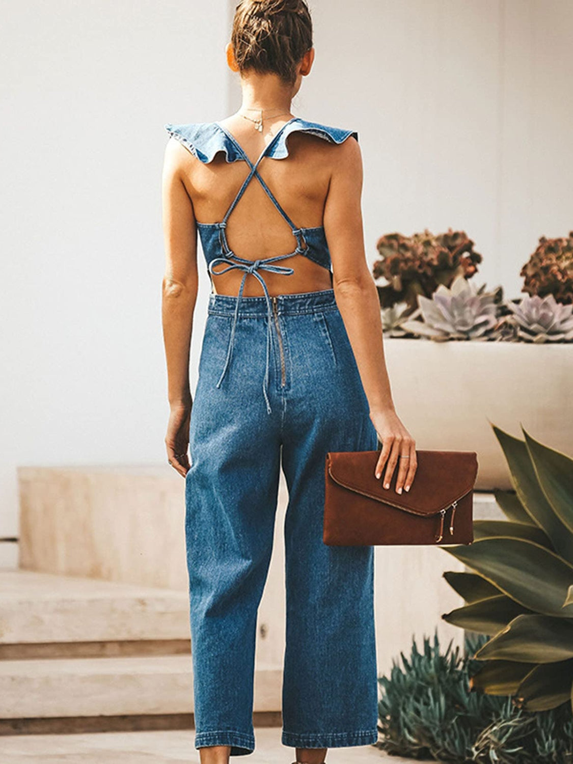 Ruffled Sleeveless Denim Jumpsuit in Medium Wash by Yolan House