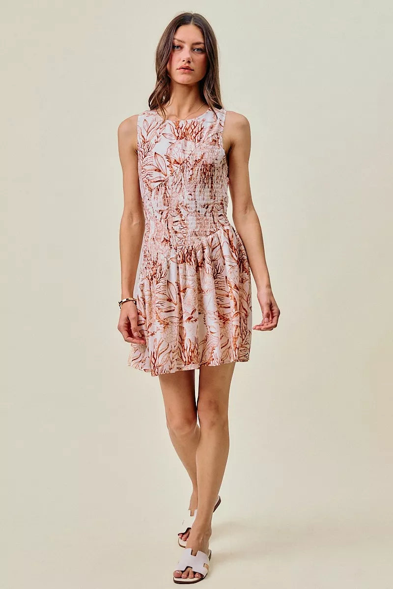 So Me Shell Print Smocked Mini Dress in Taupe