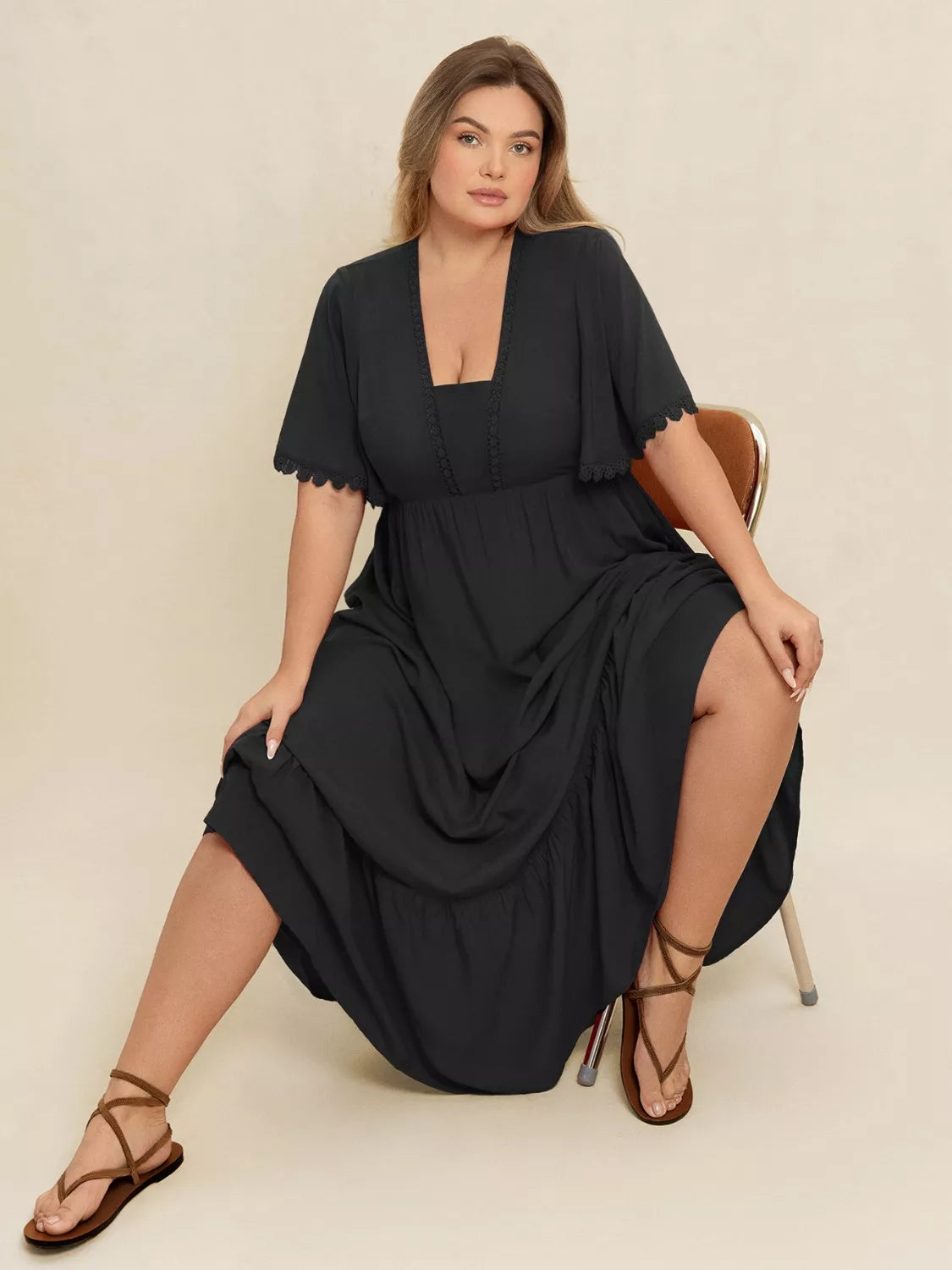 Ruffled Maxi Dress with Flutter Sleeves in Black