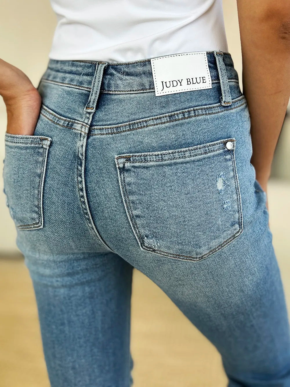 Judy Blue Mid Rise Destroyed Hem Jeans in Medium Wash
