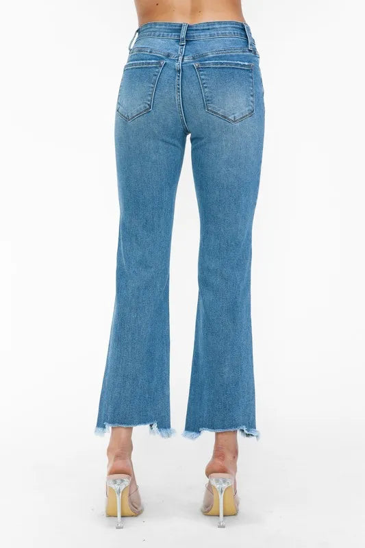 Raw Hem Distressed Mid Rise Crop Jeans in Medium Wash