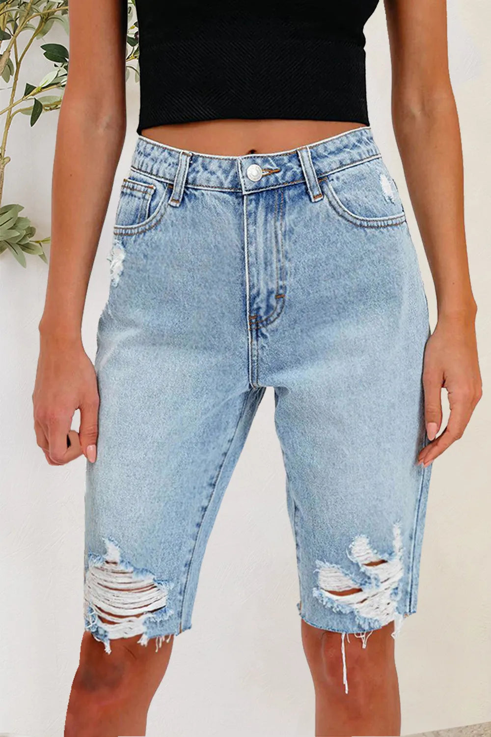 Distressed Pocketed Denim Shorts in Light Wash by DE.C.H & K.M