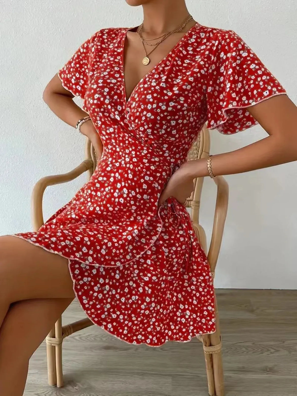 Floral Flutter Sleeve Wrap Mini Dress by Elaine