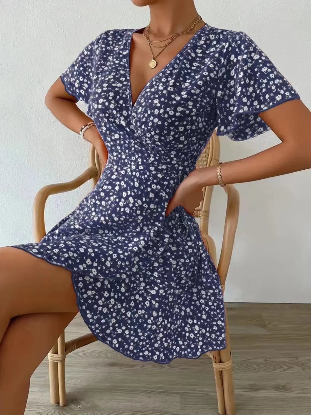Floral Flutter Sleeve Wrap Mini Dress by Elaine