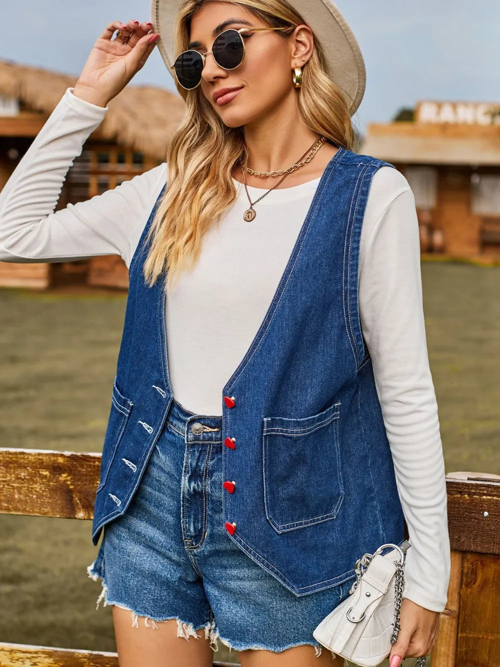 Sleeveless Denim Jacket in Dark Blue by Manny