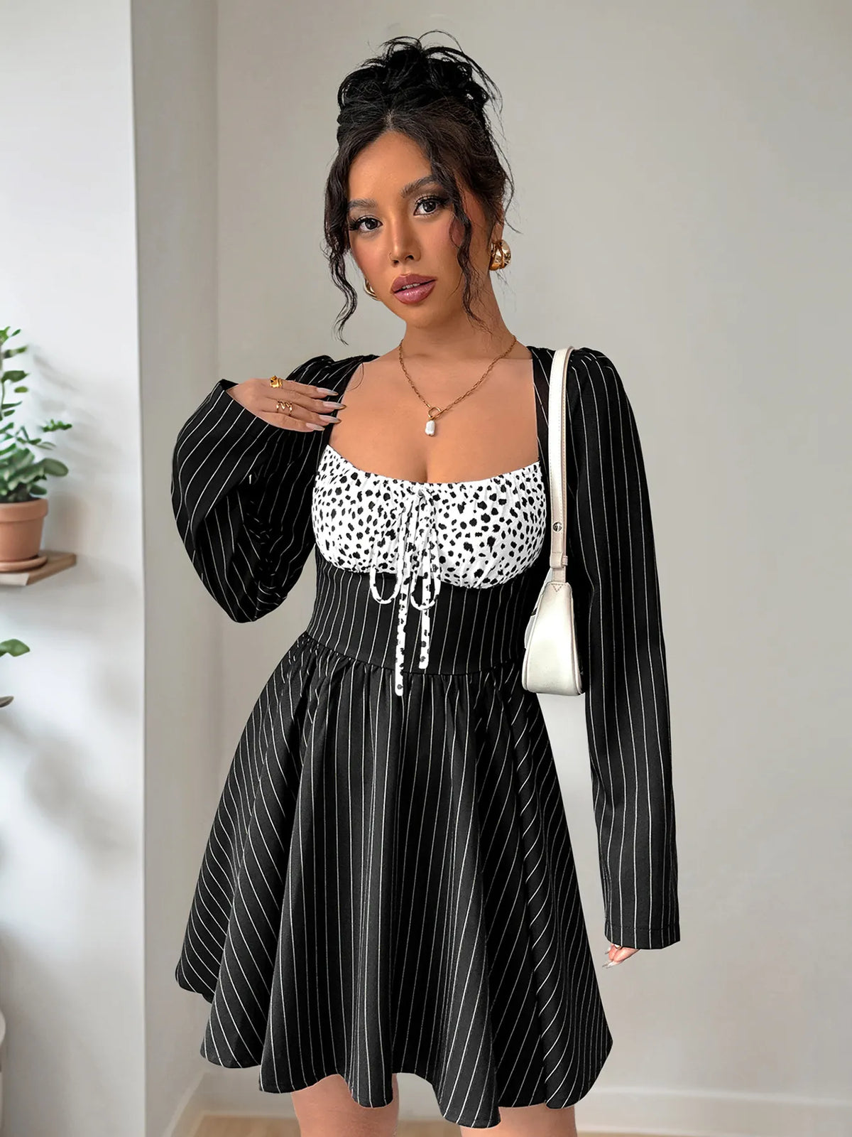 Ruffled Striped Mini Dress in Black