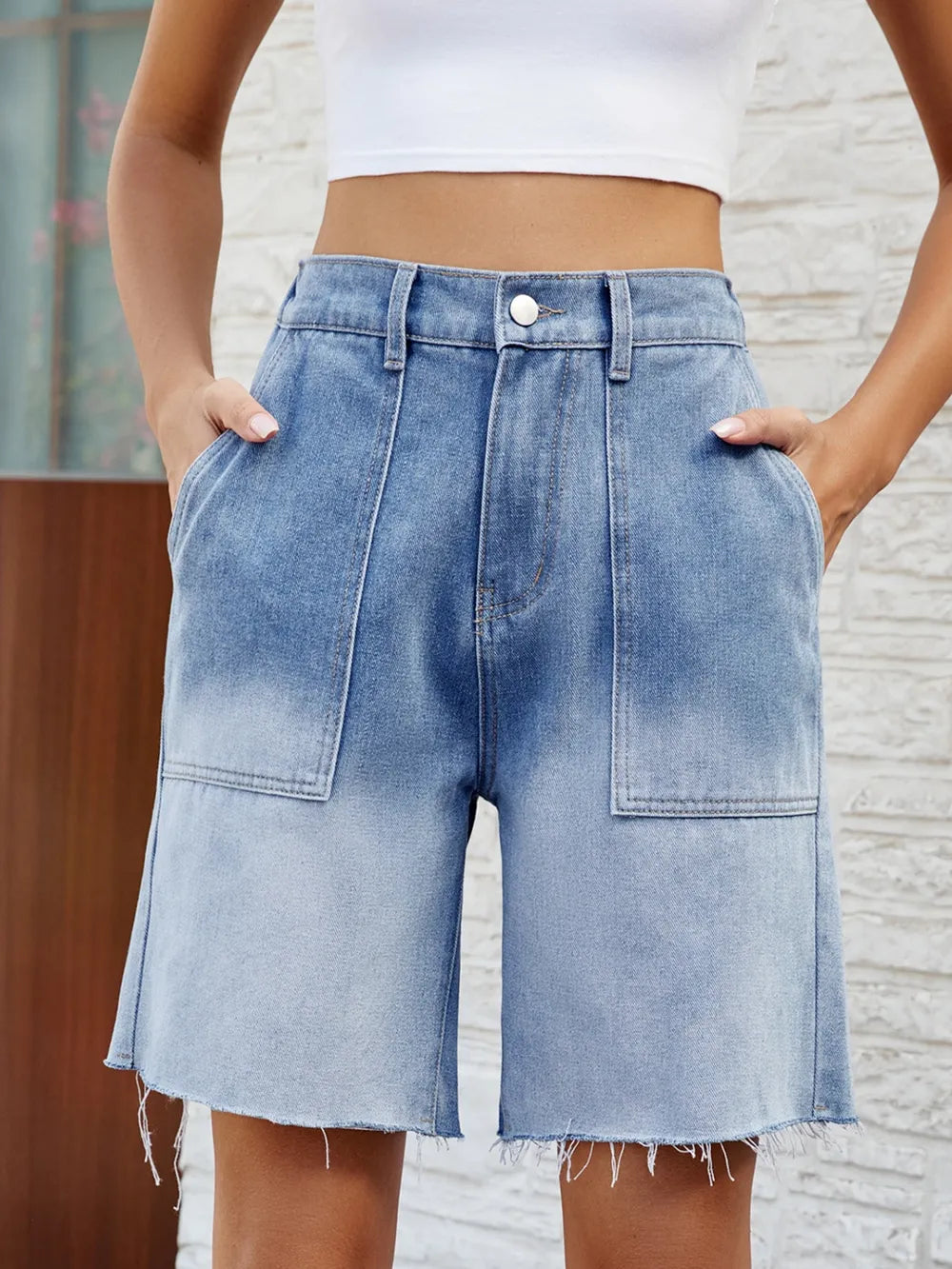 Raw Hem Denim Shorts in Light Blue by Manny