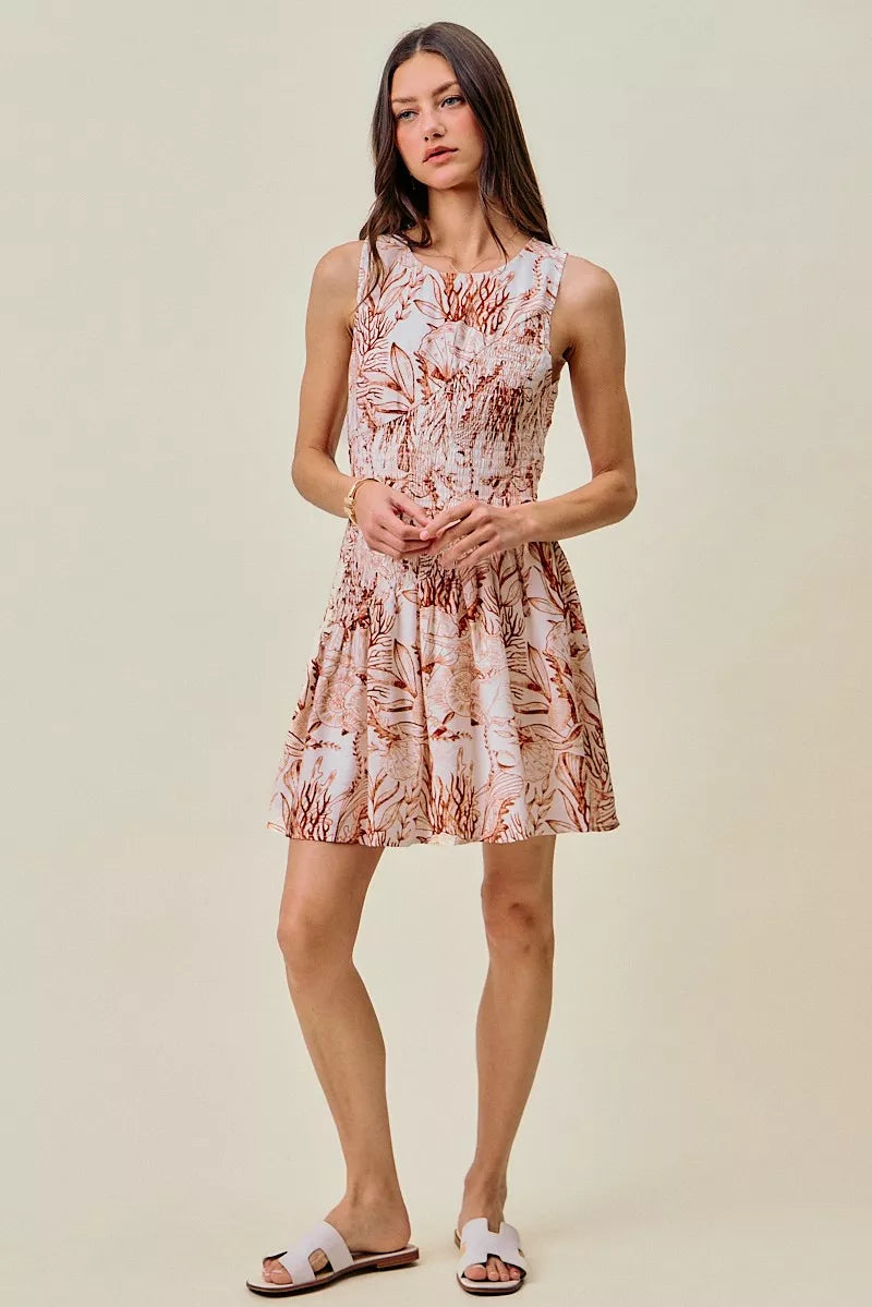 So Me Shell Print Smocked Mini Dress in Taupe