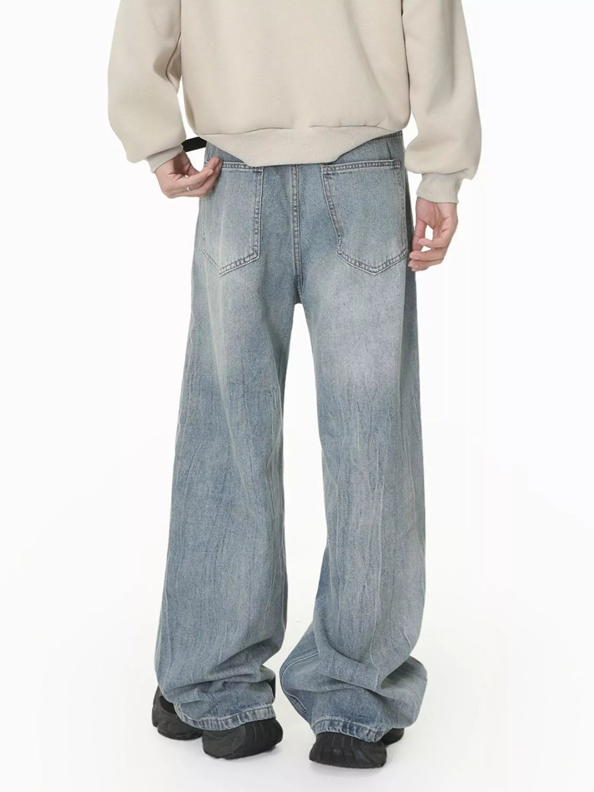 Loose Fit Washed Jeans in Light Blue by DashingTogs