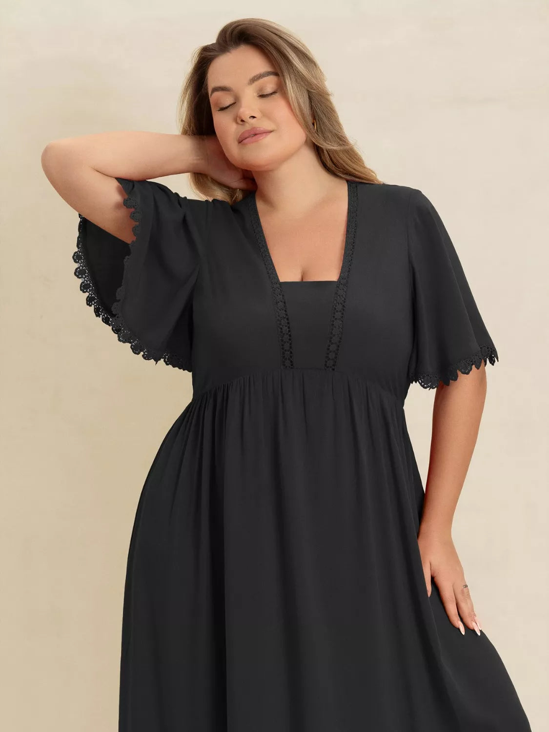 Ruffled Maxi Dress with Flutter Sleeves in Black
