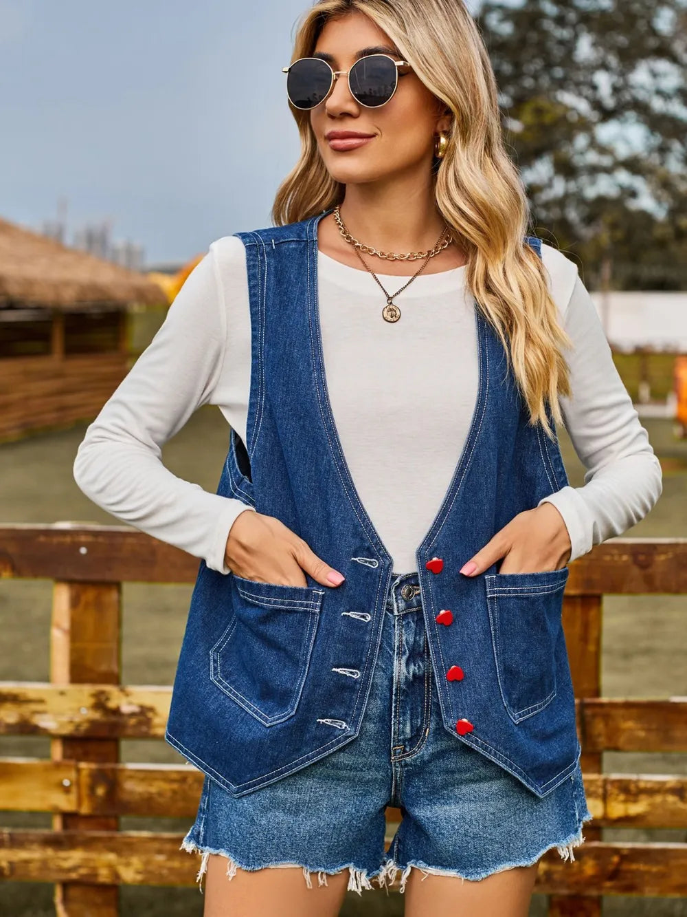 Sleeveless Denim Jacket in Dark Blue by Manny