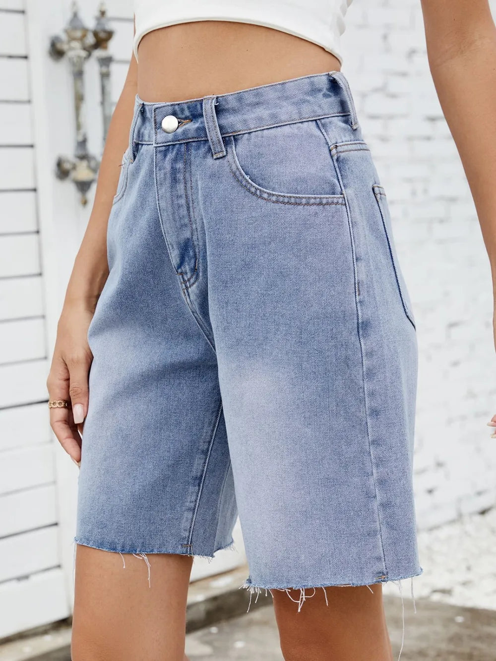 Washed Raw Hem Denim Shorts by Moni Wear