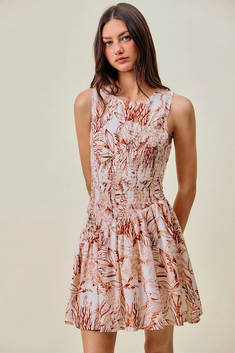 So Me Shell Print Smocked Mini Dress in Taupe