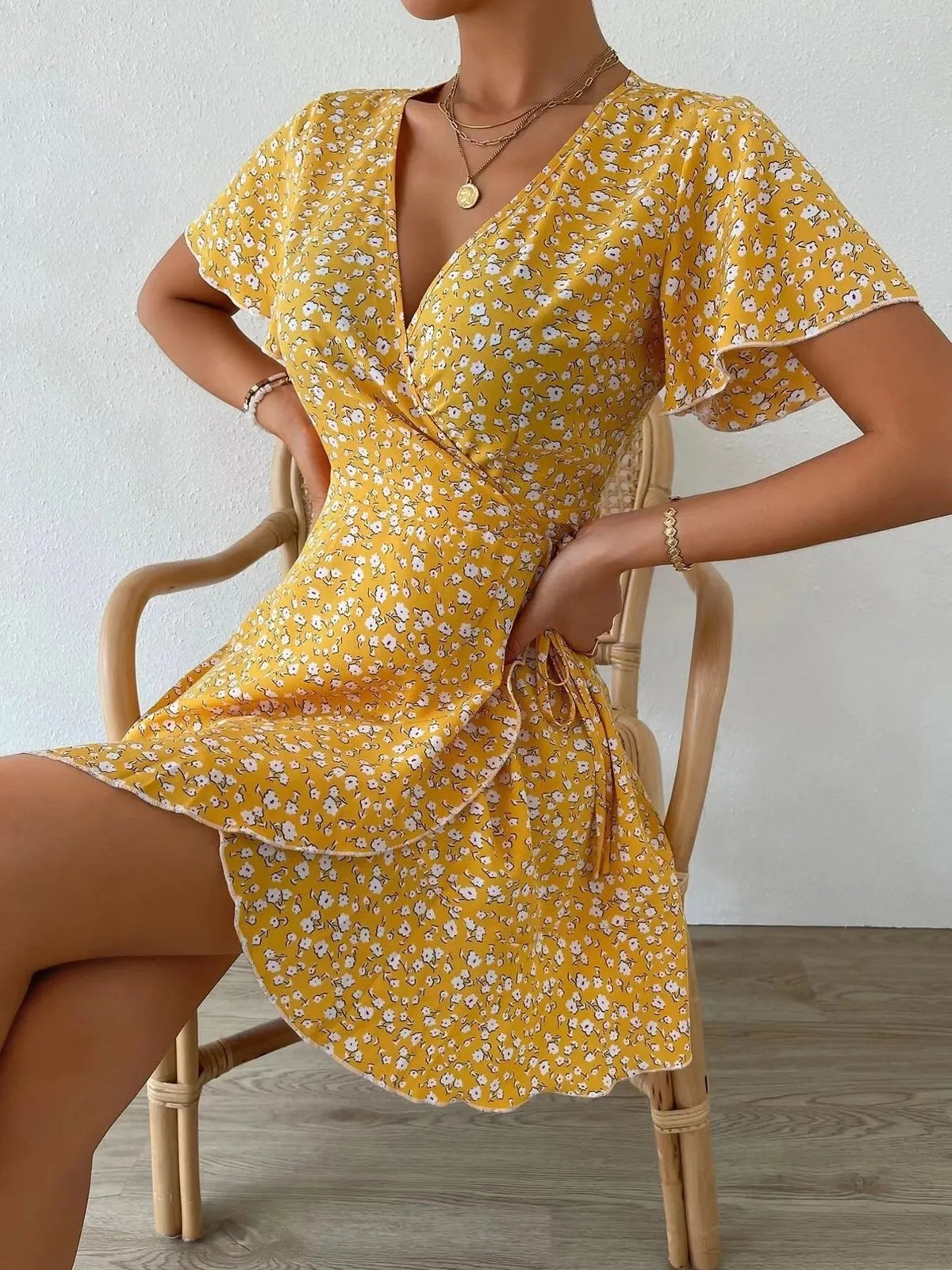 Floral Flutter Sleeve Wrap Mini Dress by Elaine
