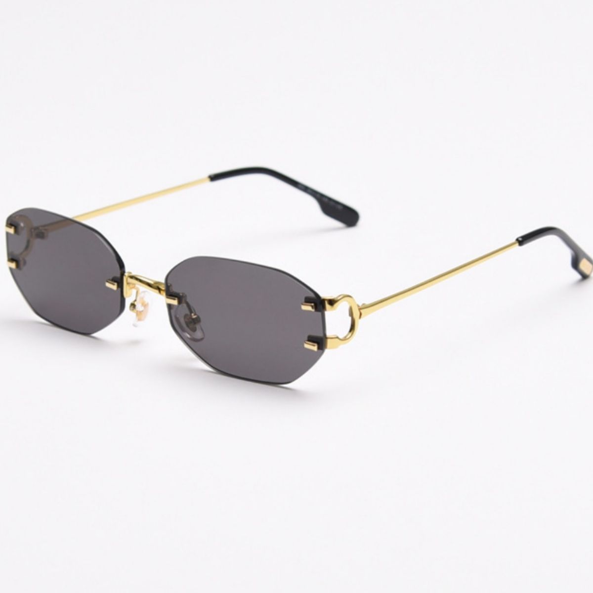 Ilussa Rimless Oval Sunglasses in gold
