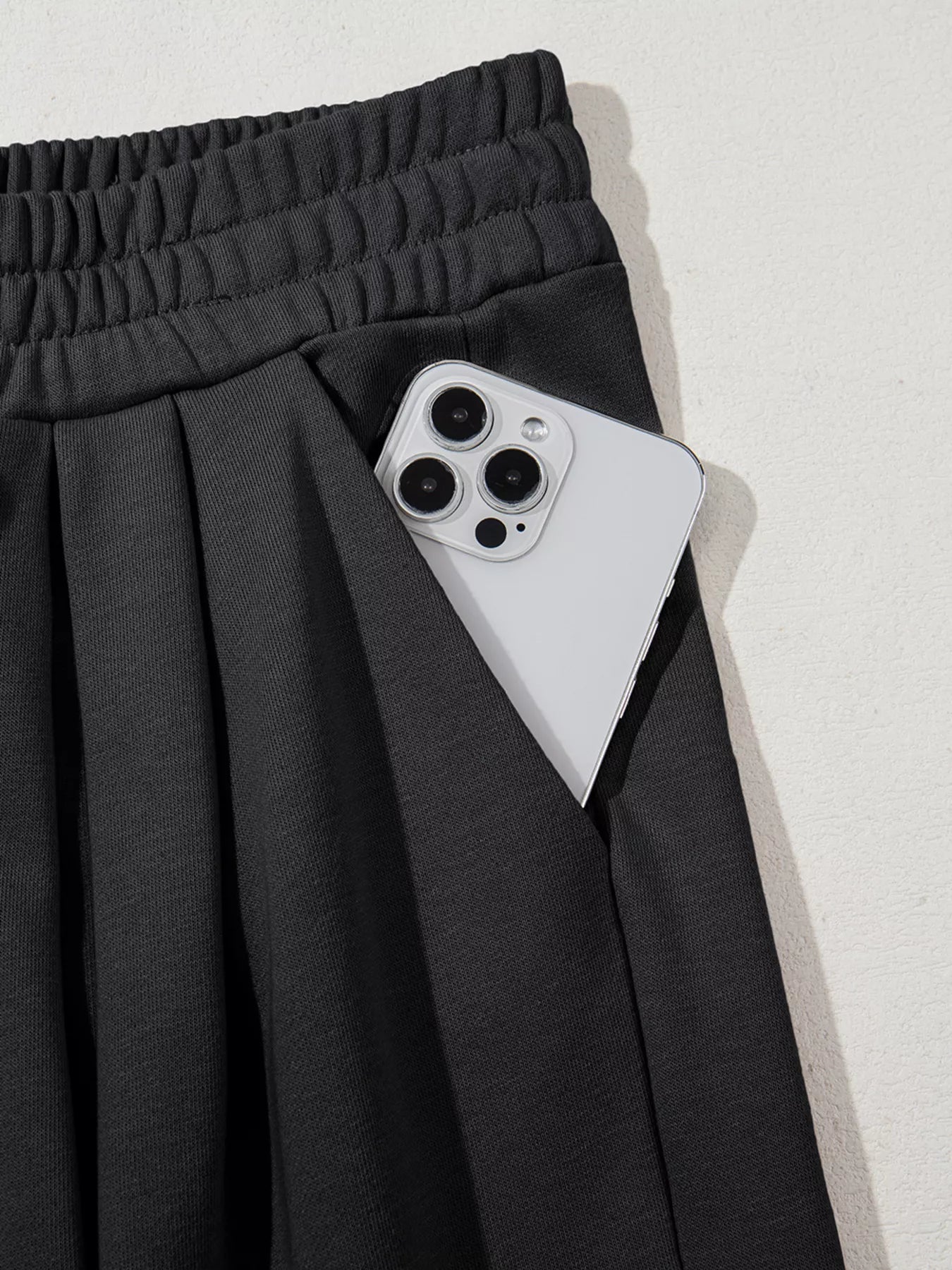 High-Waist Pleated Sweatpants in Black