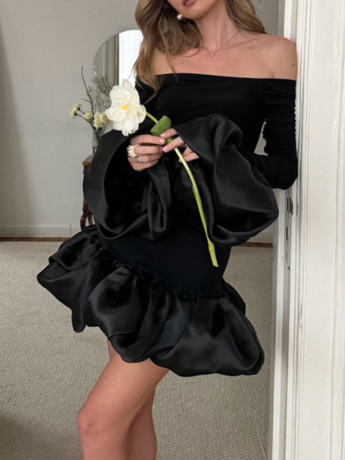 Off-Shoulder Ruffle Hem Mini Dress in Black