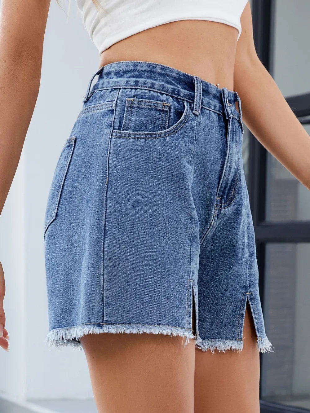 Raw Hem Slit Denim Shorts by Moni Wear