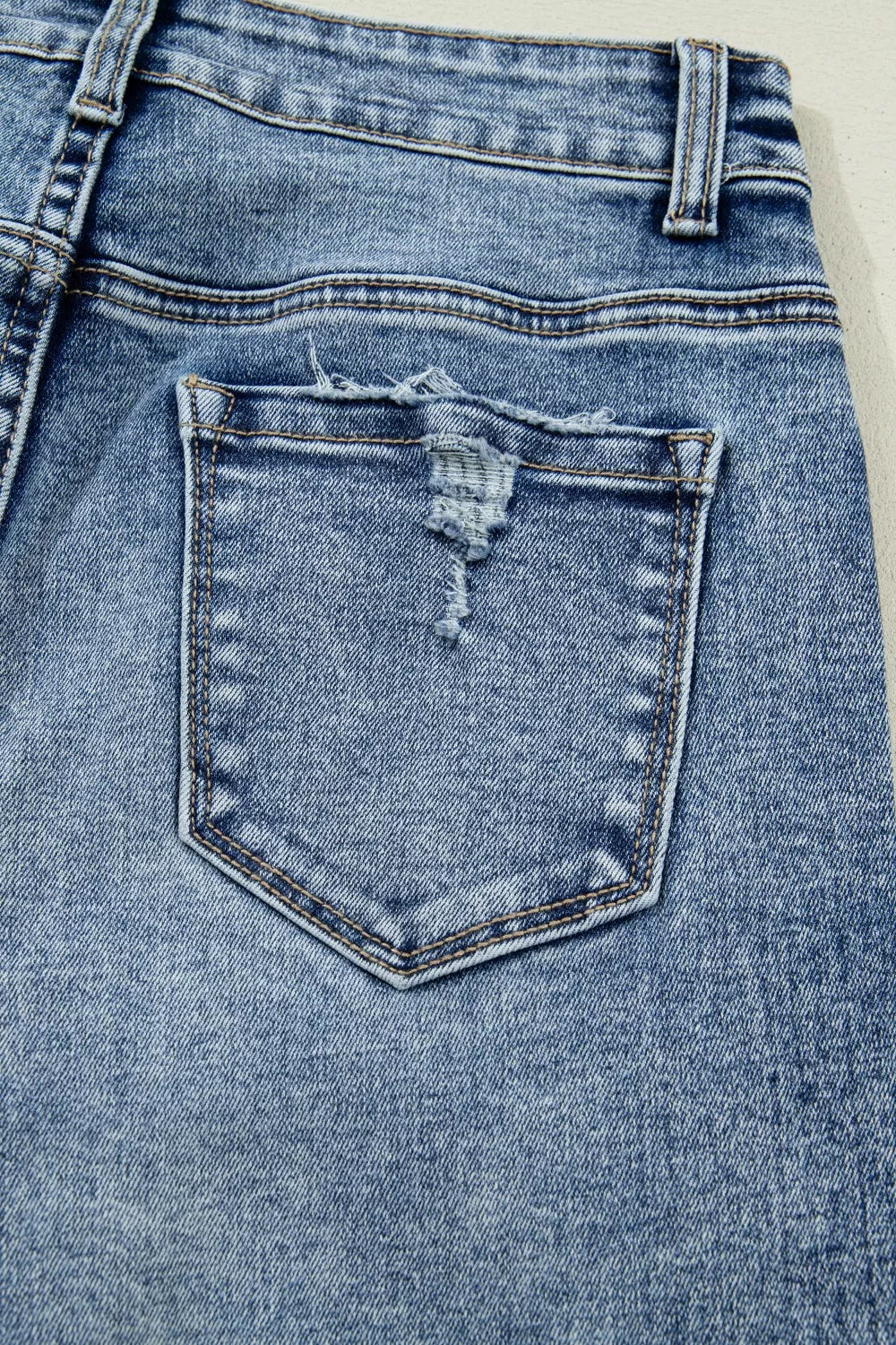 Cuffed Straight-Leg Distressed Jeans in Medium Wash
