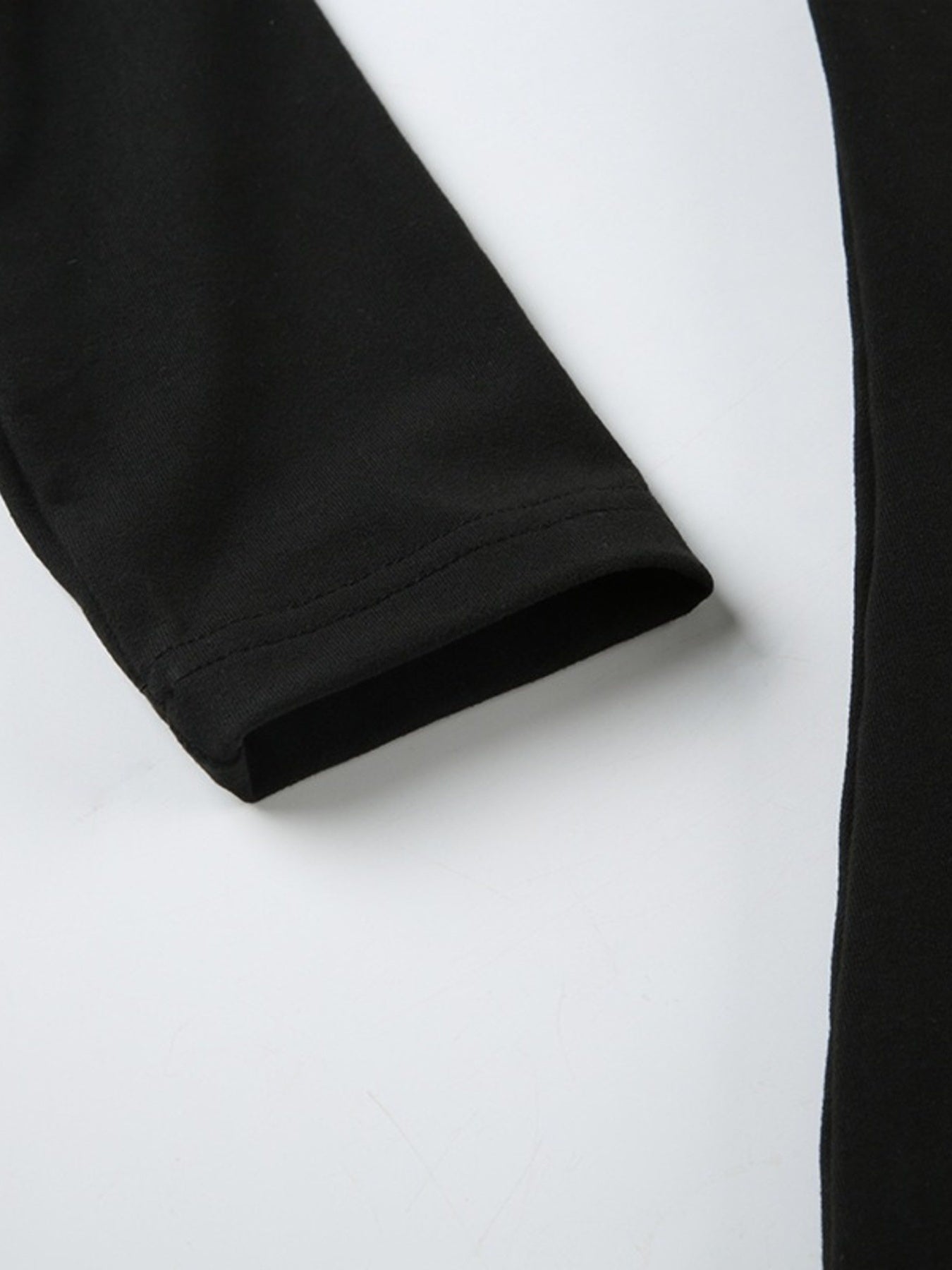Ruched Long-Sleeve Active Romper in Black