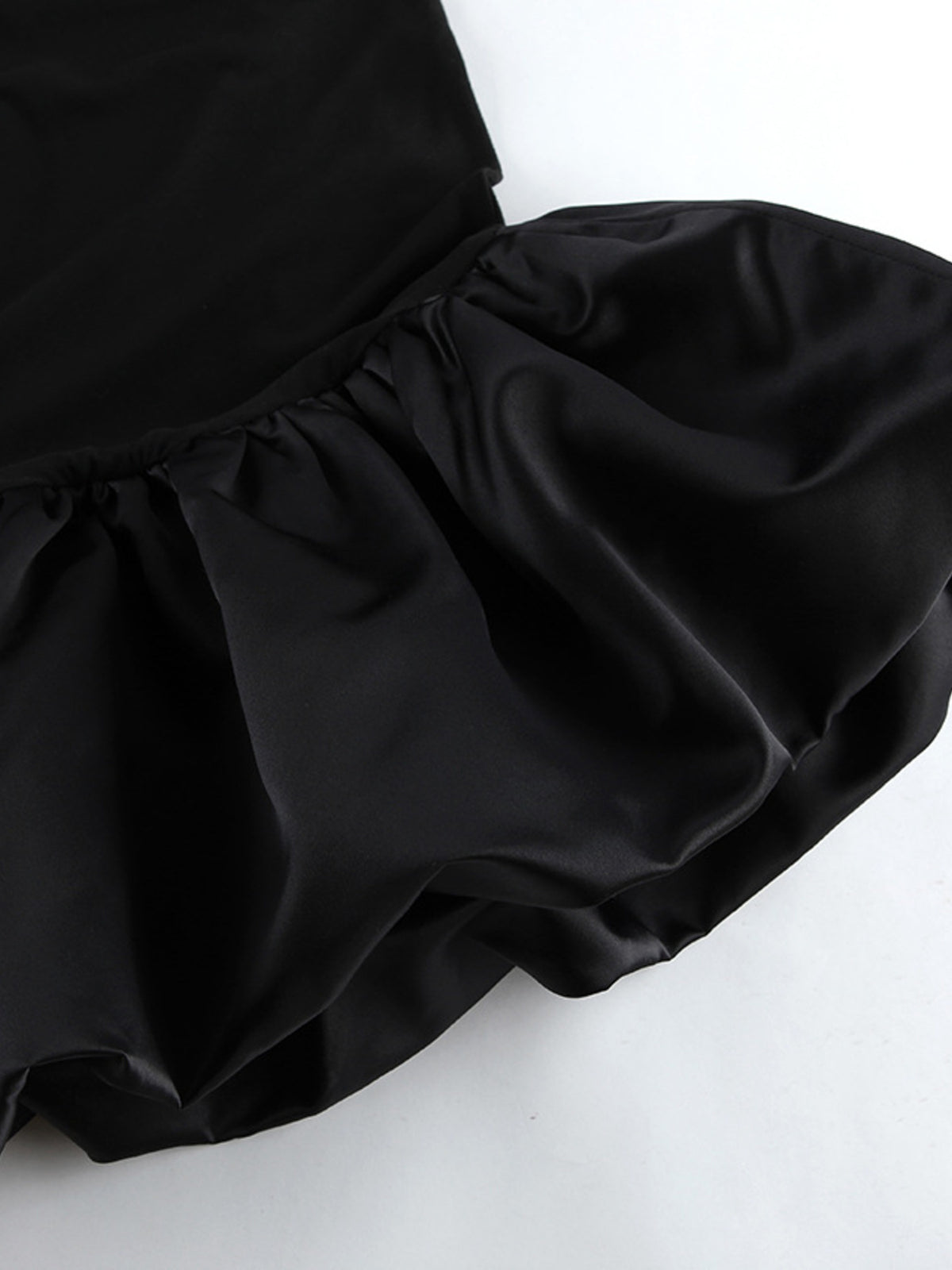 Off-Shoulder Ruffle Hem Mini Dress in Black