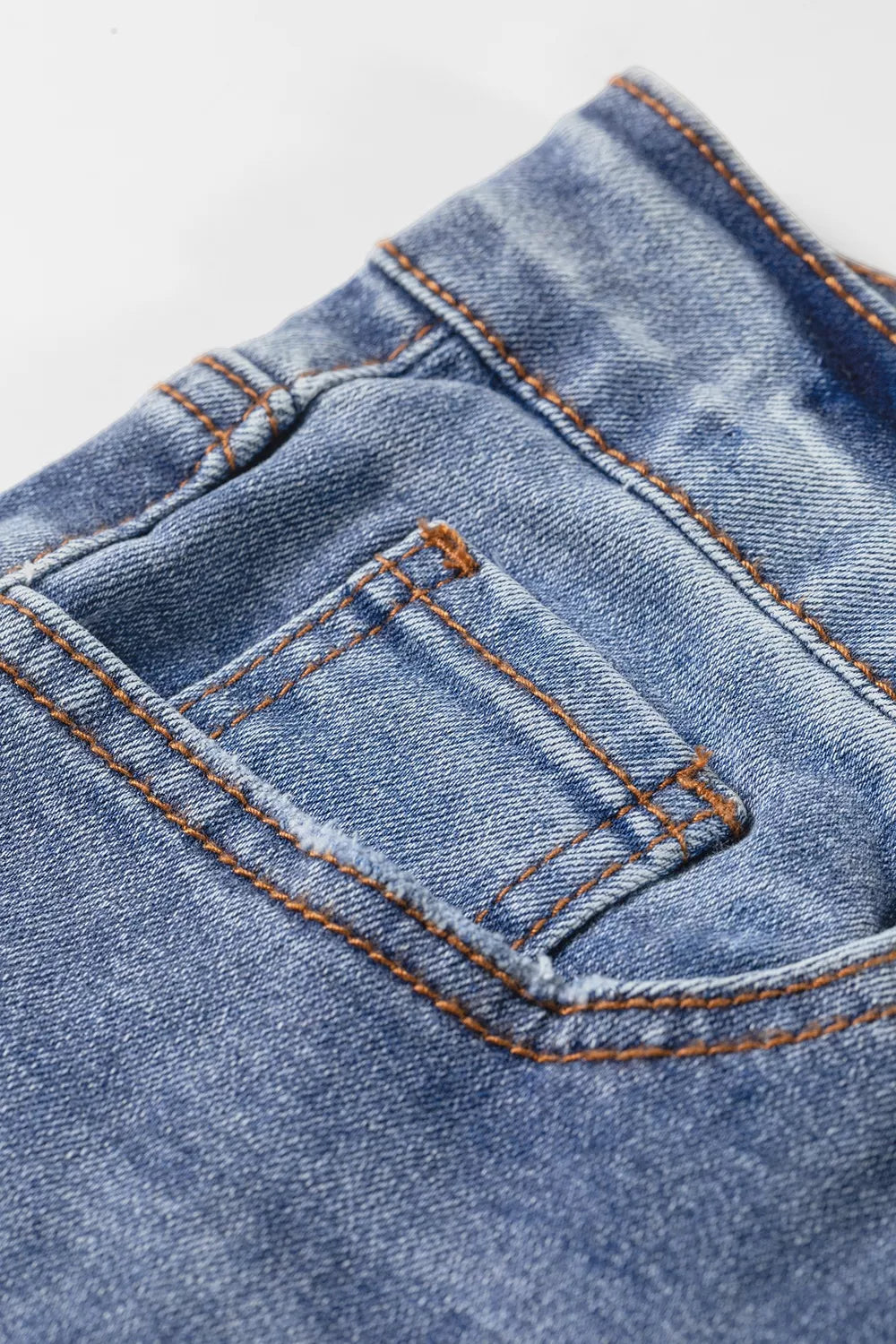 Embroidered Flare Leg Jeans in Medium Wash