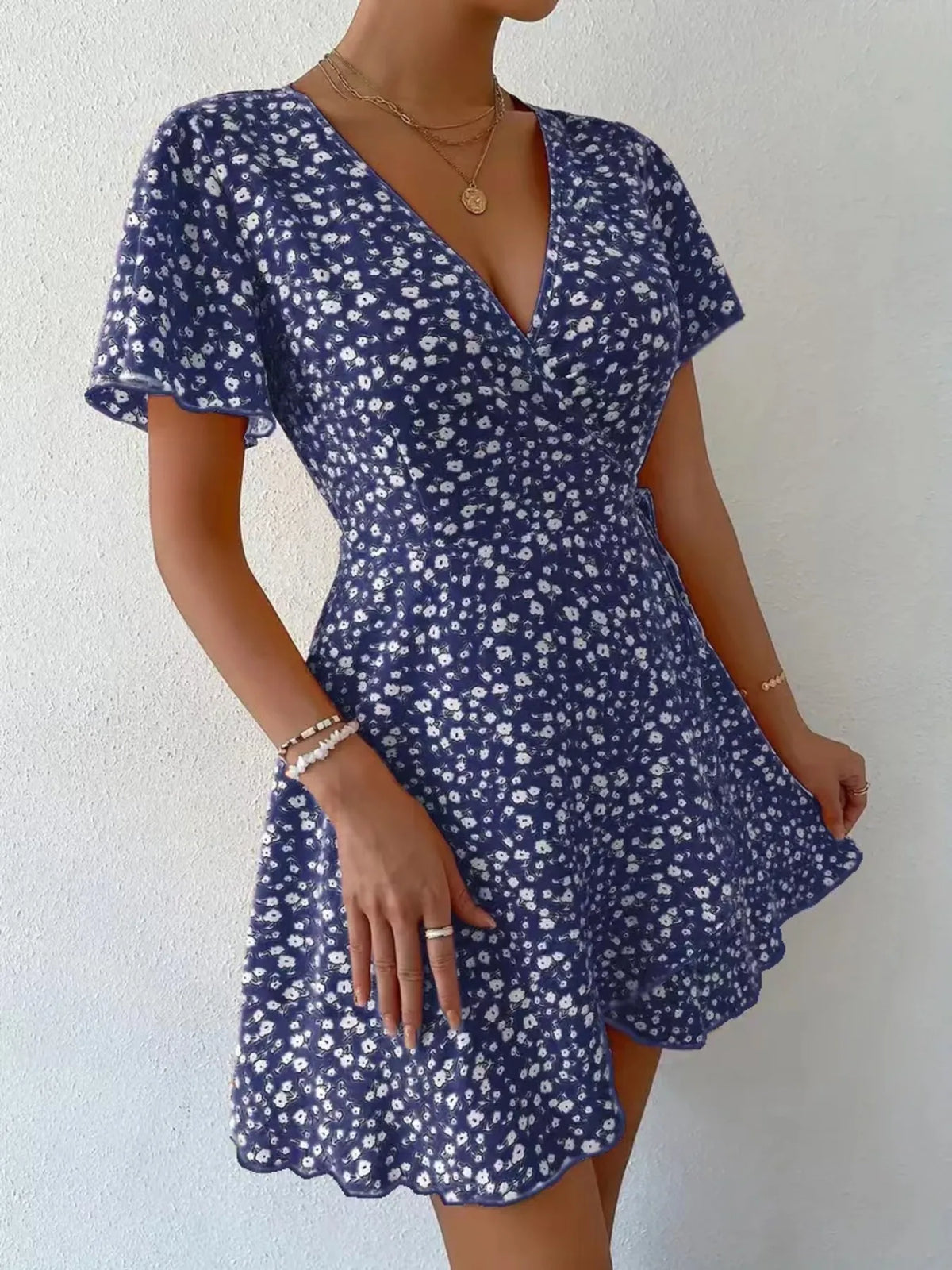 Floral Flutter Sleeve Wrap Mini Dress by Elaine