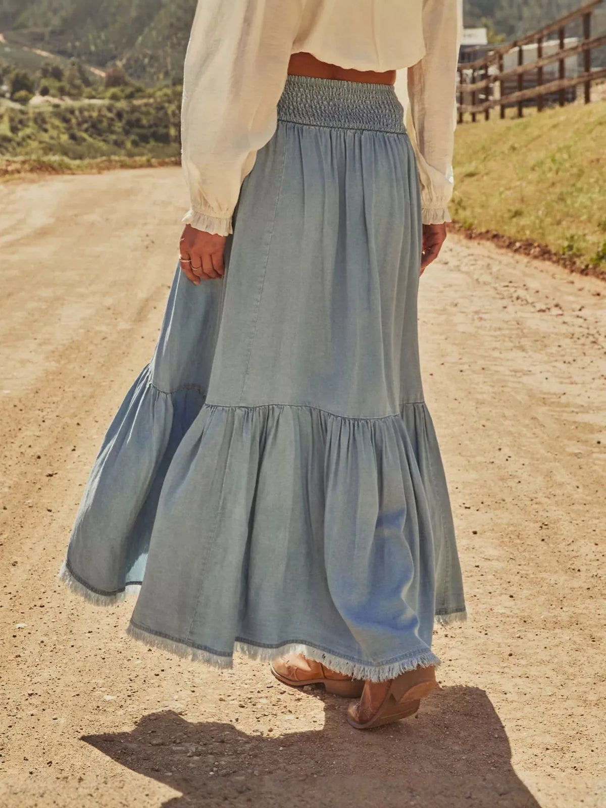 High-Low Frayed Hem Denim Skirt in Light Blue
