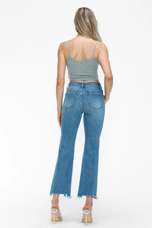 Raw Hem Distressed Mid Rise Crop Jeans in Medium Wash